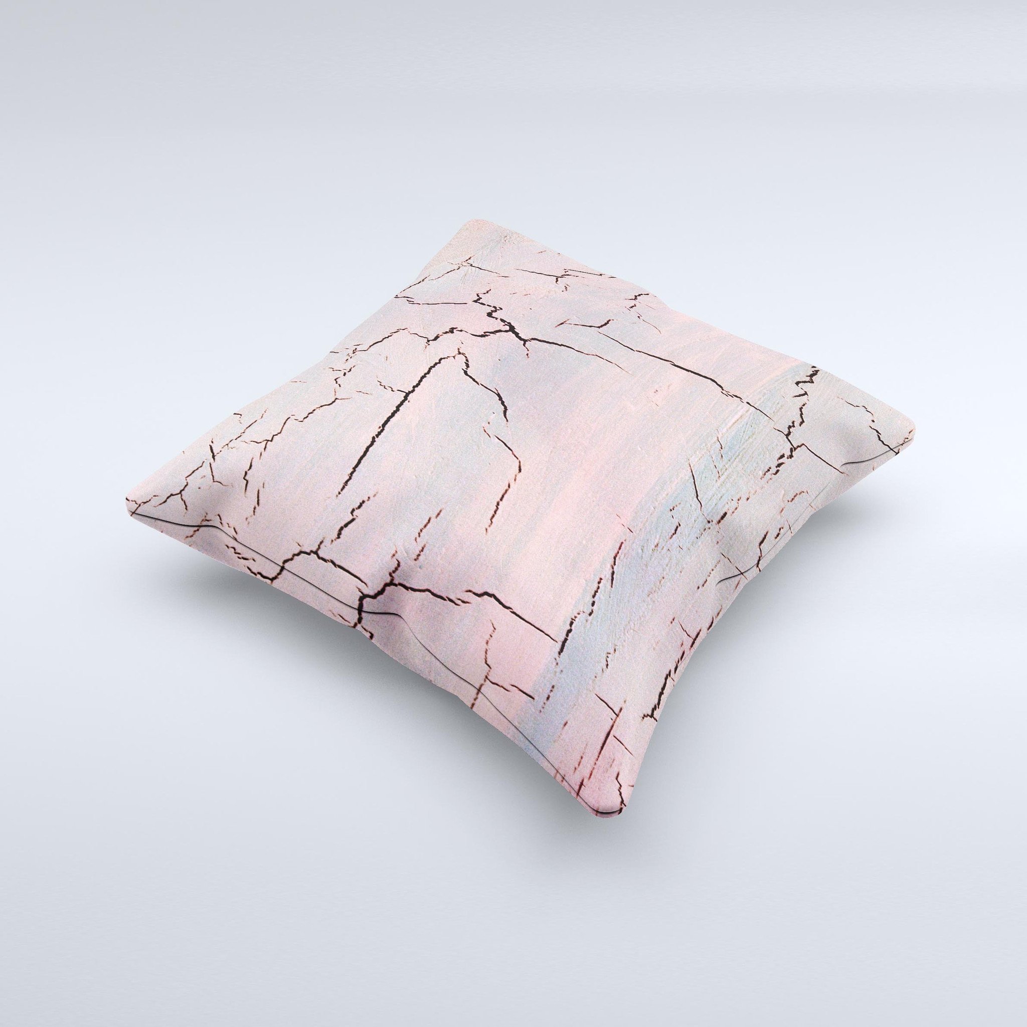Pink decorative throw pillow with a cracked surface texture, handcrafted in Virginia, showcasing unique design and high-quality fabric.