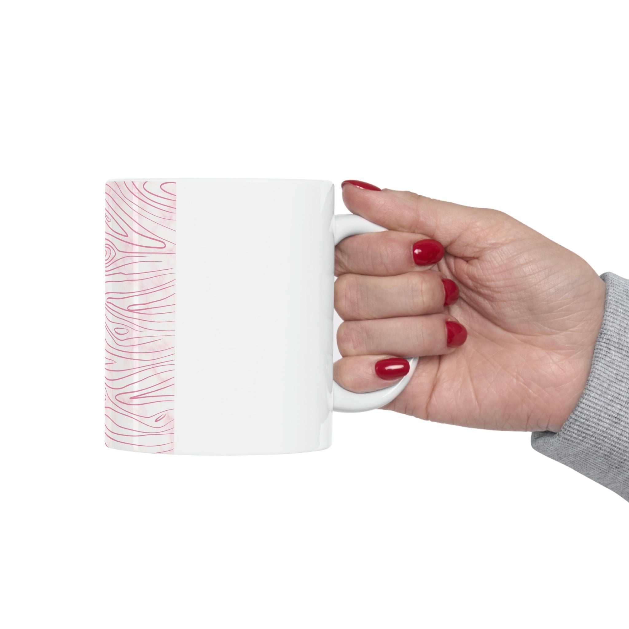 A stylish pink ceramic mug featuring a unique line art sketch print, perfect for coffee or tea.
