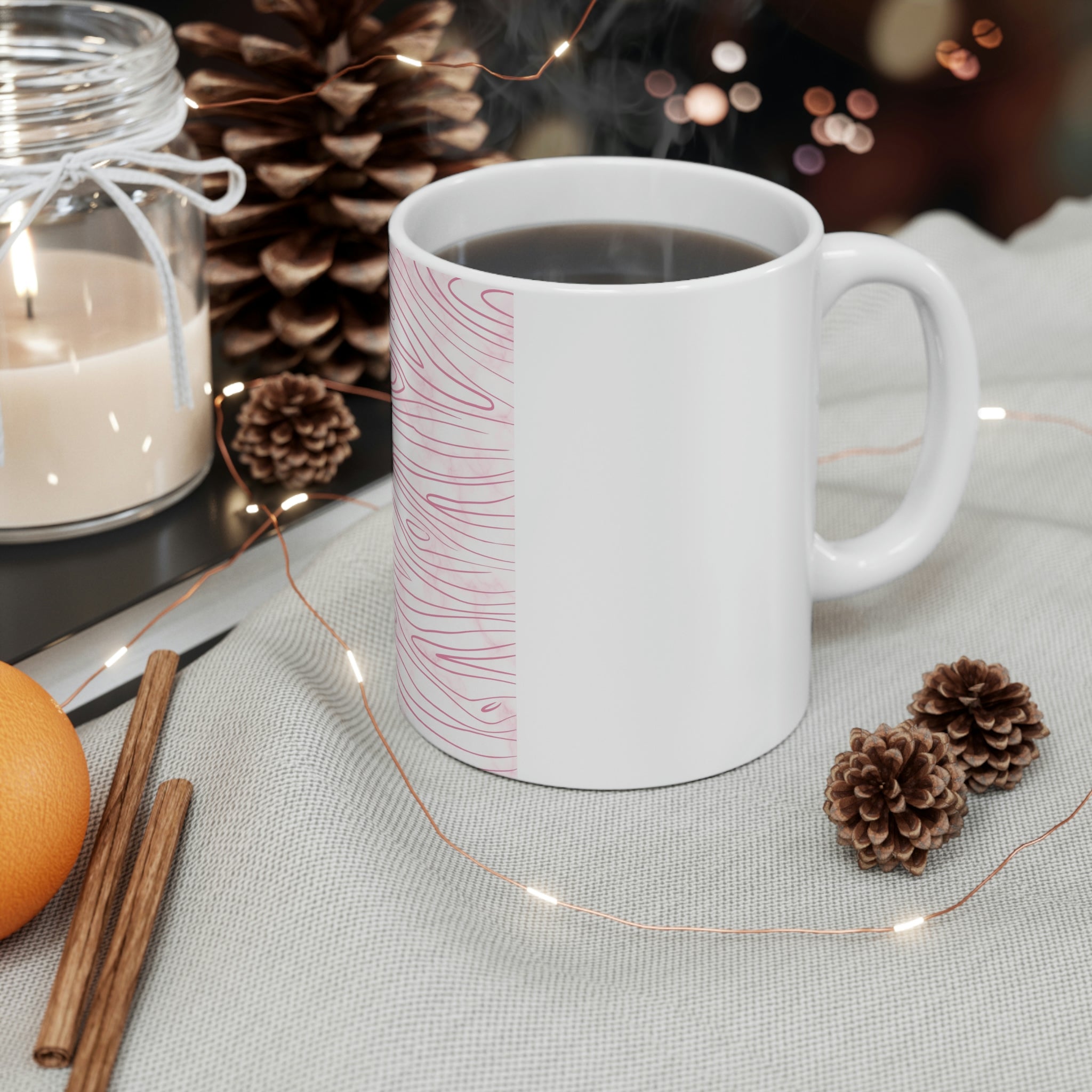 A stylish pink ceramic mug featuring a unique line art sketch print, perfect for coffee or tea.