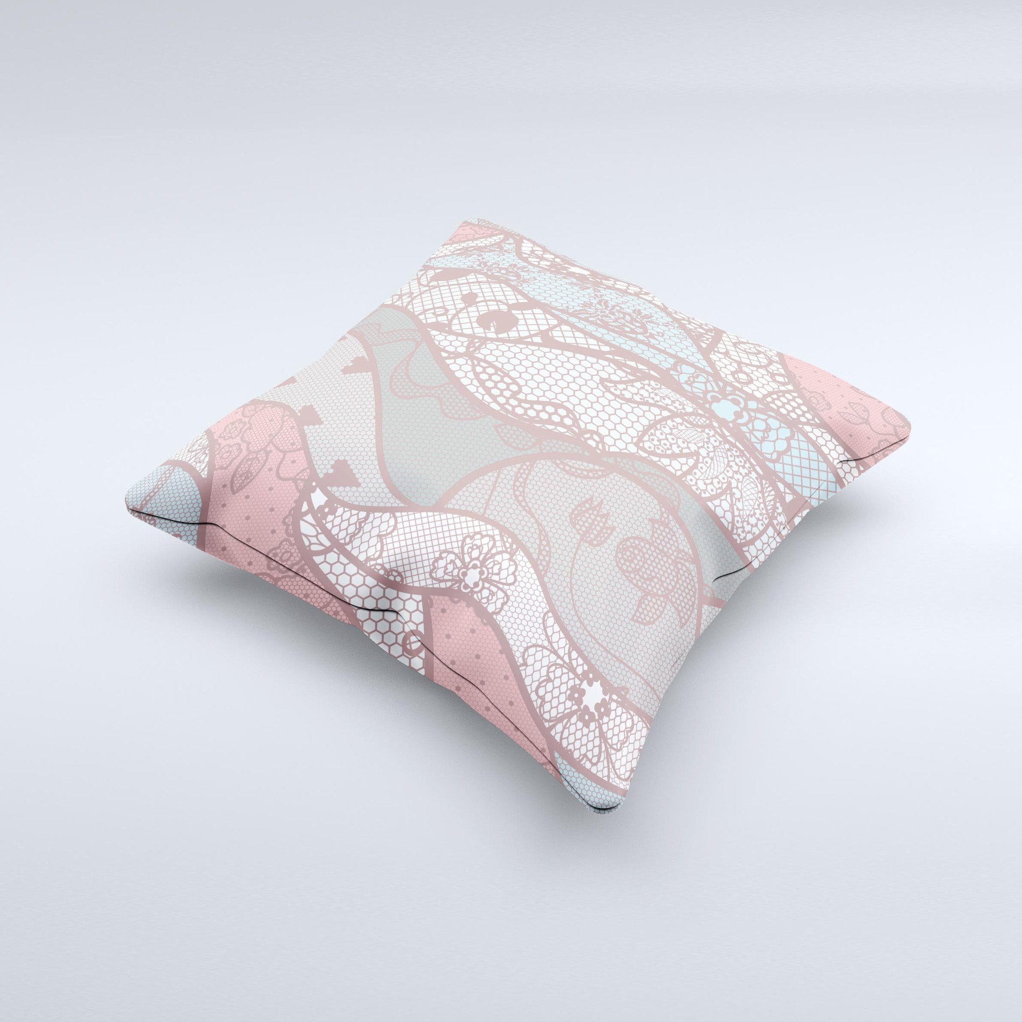 Pink and teal decorative throw pillow featuring a lace design, handcrafted in Virginia with high thread count fabric and polyester filling.