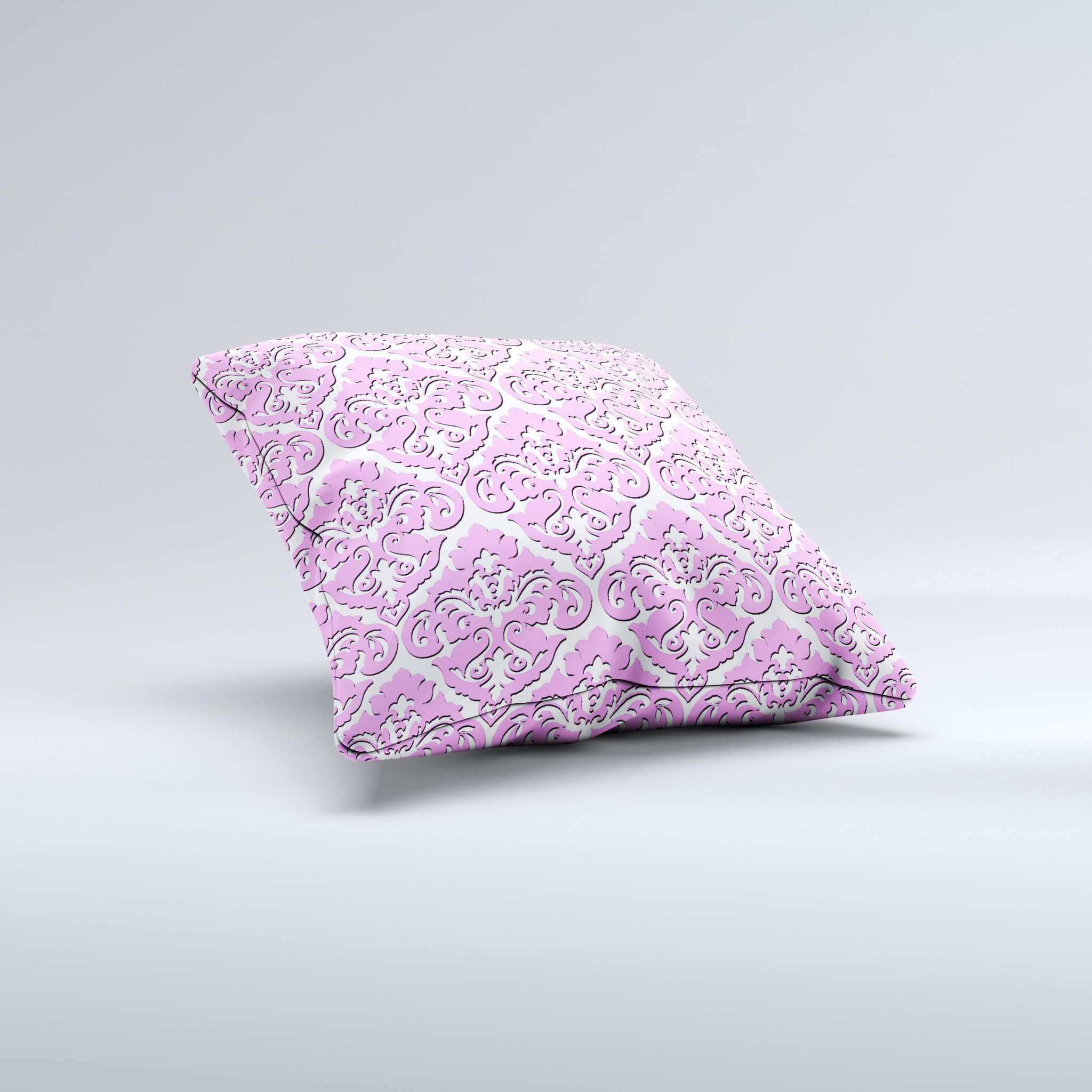 Pink and white decorative throw pillow with a delicate pattern, handcrafted in Virginia, showcasing unique ink-fuzed design.