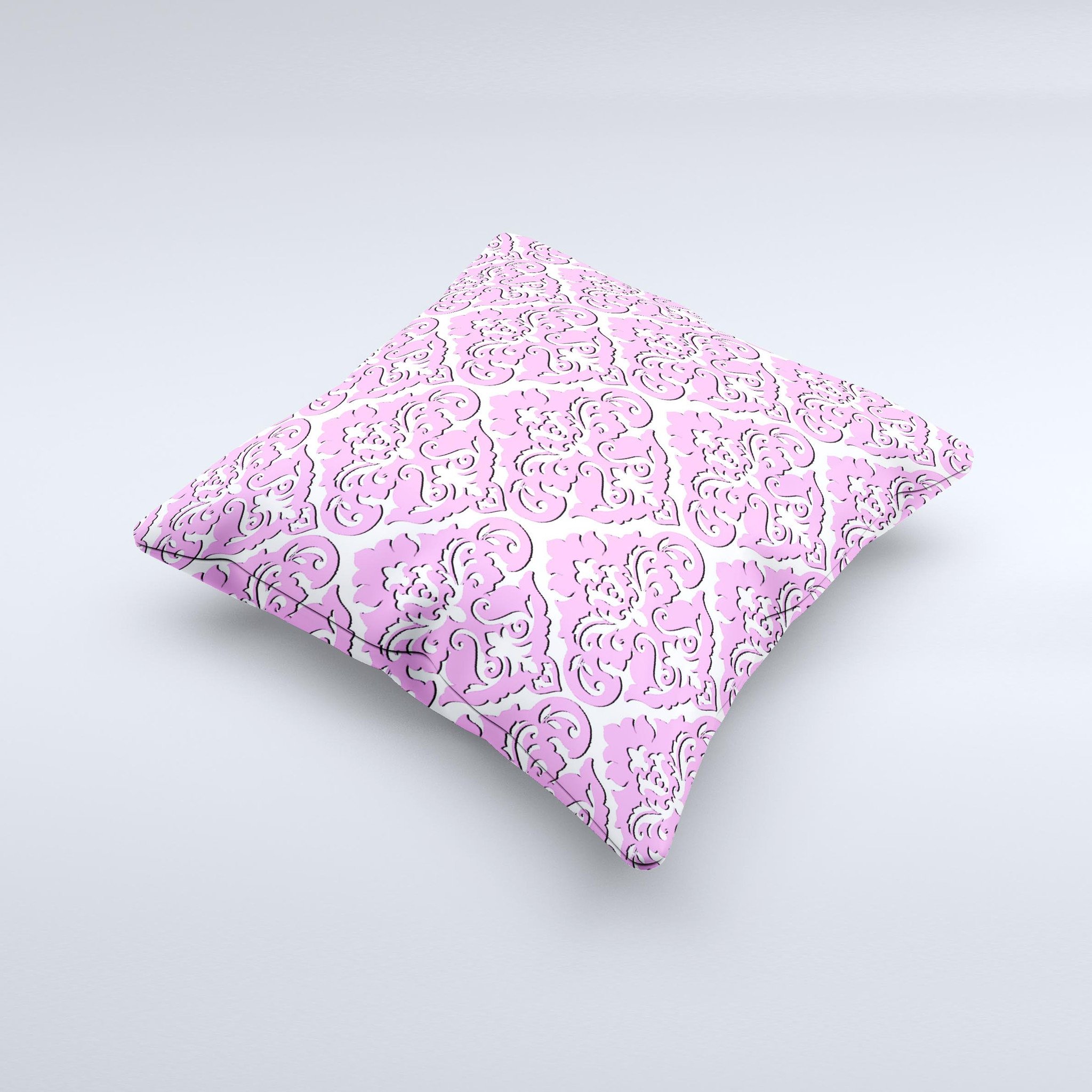 Pink and white decorative throw pillow with a delicate pattern, handcrafted in Virginia, showcasing unique ink-fuzed design.