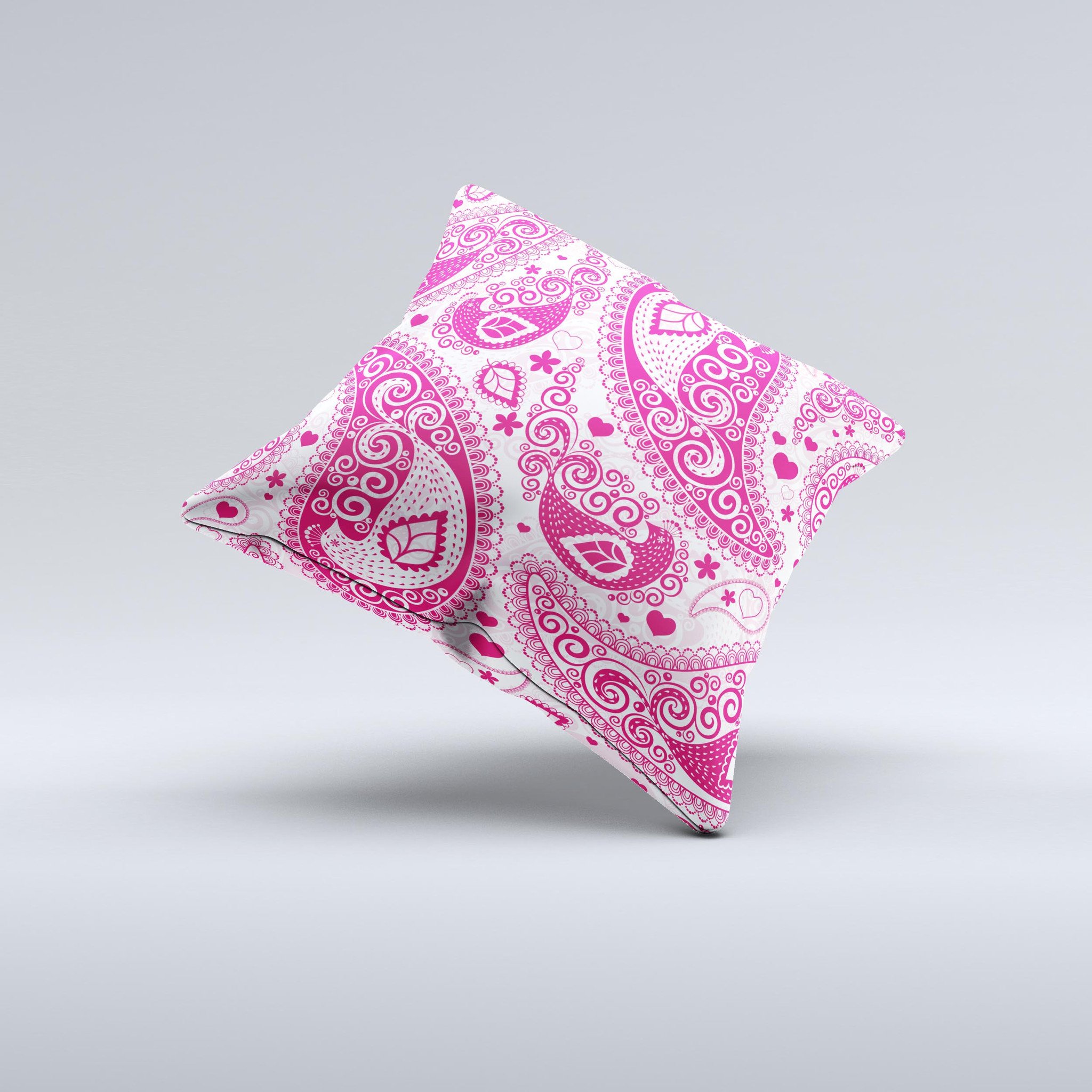 Pink and white decorative throw pillow featuring a paisley pattern, handcrafted in Virginia with high thread count fabric and polyester filling.
