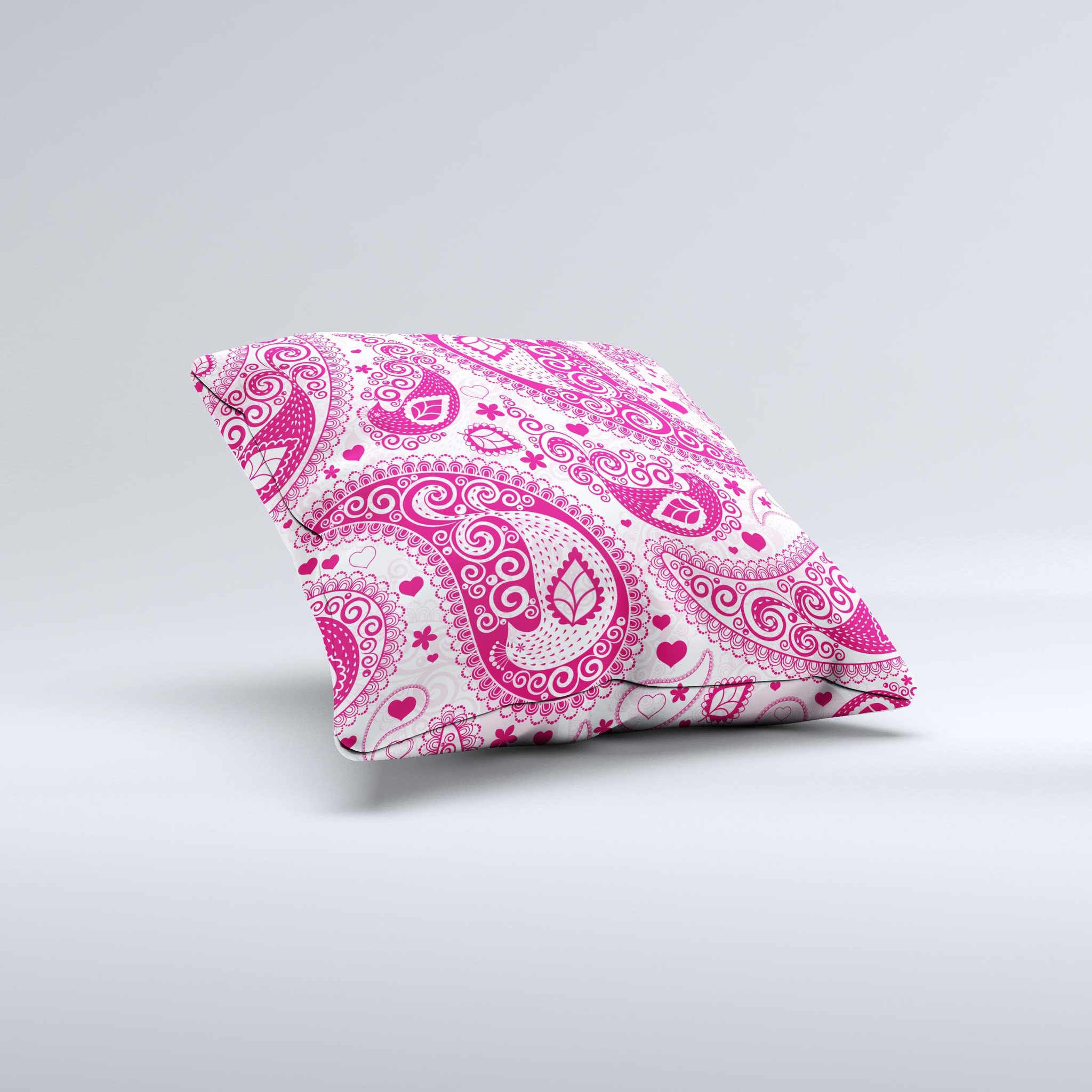 Pink and white decorative throw pillow featuring a paisley pattern, handcrafted in Virginia with high thread count fabric and polyester filling.