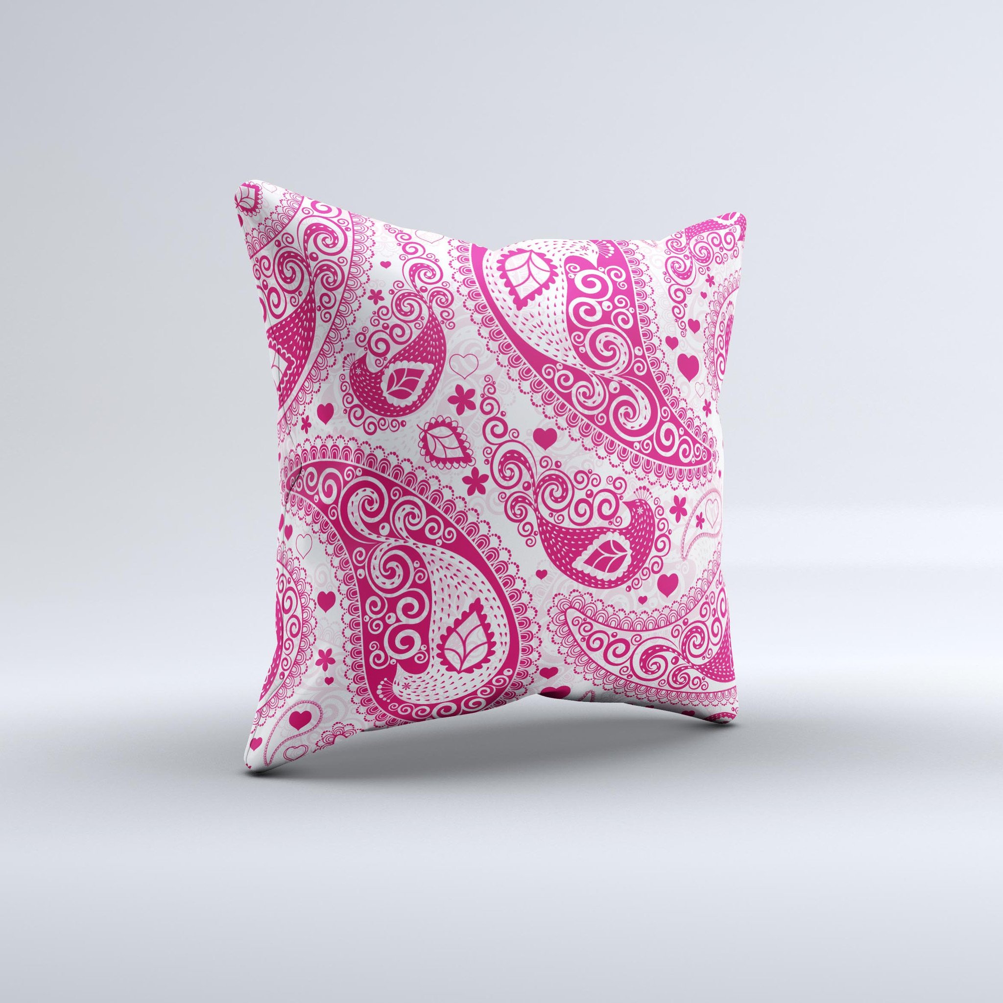 Pink and white decorative throw pillow featuring a paisley pattern, handcrafted in Virginia with high thread count fabric and polyester filling.