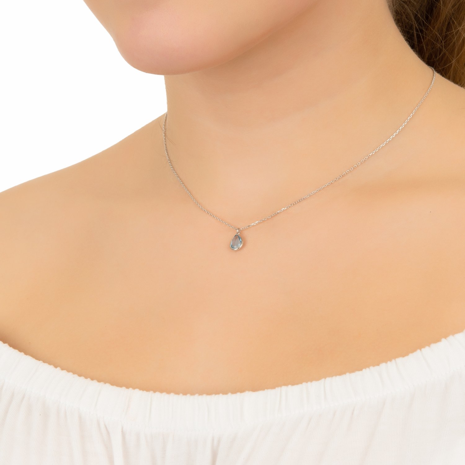 Pisa Mini Teardrop Necklace in Silver featuring a Blue Topaz gemstone, elegantly designed with a fine chain.