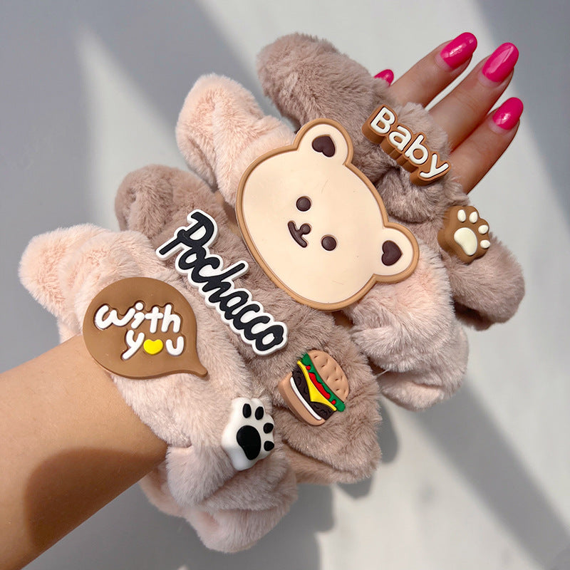 Plush bear hair ring featuring a cute bear face and milk tea-colored hair, perfect for adding cuteness to any hairstyle.