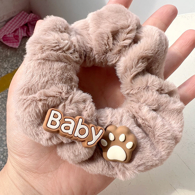 Plush bear hair ring featuring a cute bear face and milk tea-colored hair, perfect for adding cuteness to any hairstyle.