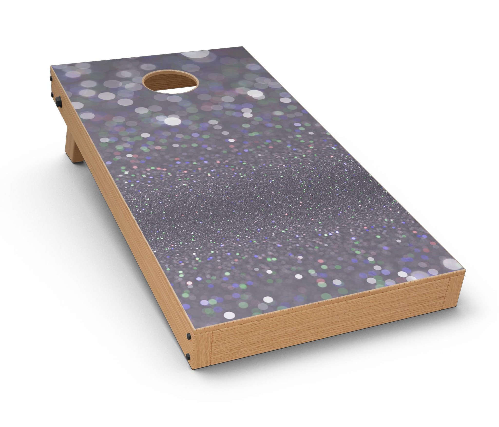 Purple and Black Unfocused Orbs of Light Cornhole Board Skin Decal Kit displayed on a wooden surface, showcasing vibrant colors and design.