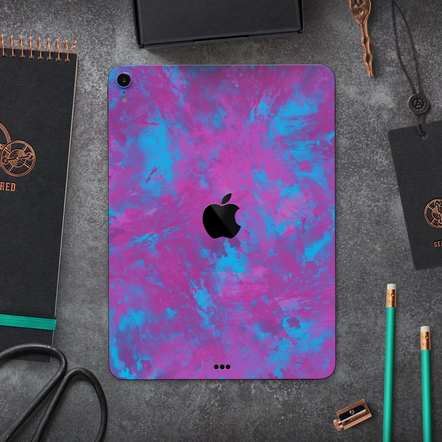 Purple and Blue Paintburst skin decal for Apple iPad, showcasing vibrant colors and sleek design.