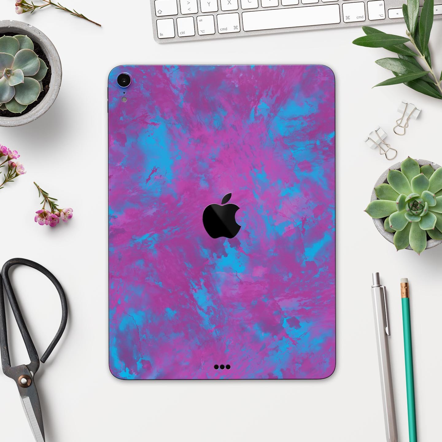 Purple and Blue Paintburst skin decal for Apple iPad, showcasing vibrant colors and sleek design.