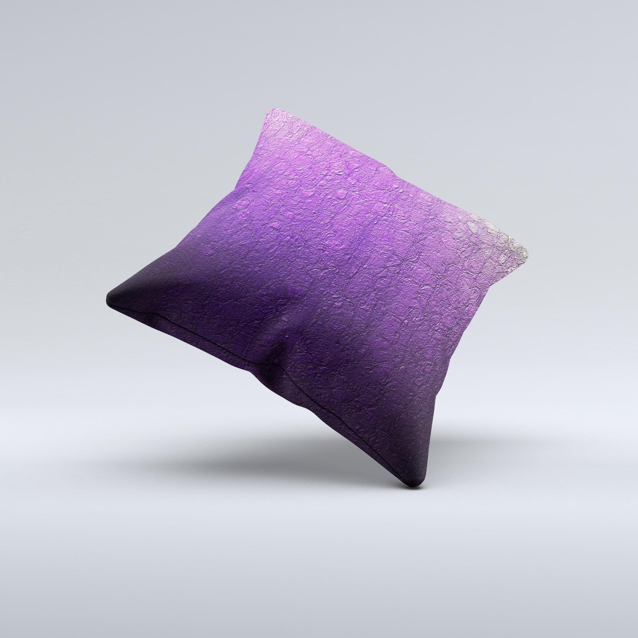 Purpled decorative throw pillow with a crackled pattern, showcasing vibrant colors and a unique handmade design.