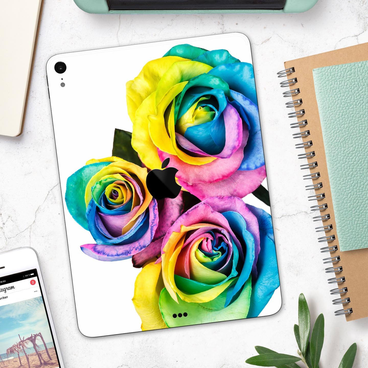 Colorful Rainbow Dyed Roses skin decal for Apple iPad Pro, showcasing vibrant floral design and ultra-thin protection.
