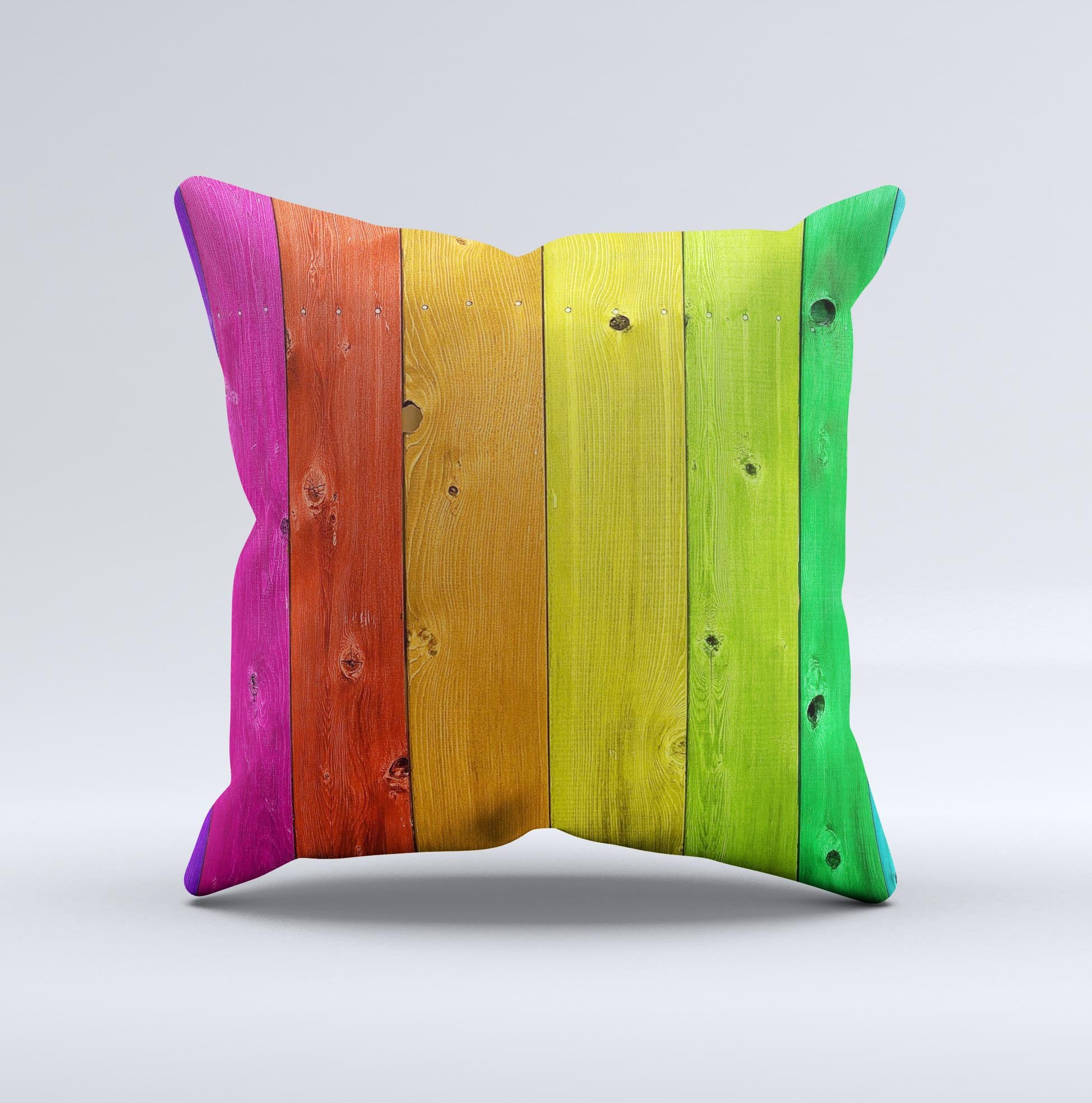 A colorful decorative throw pillow featuring a rainbow highlighted wooden planks design, handcrafted in Virginia with a soft fabric cover.
