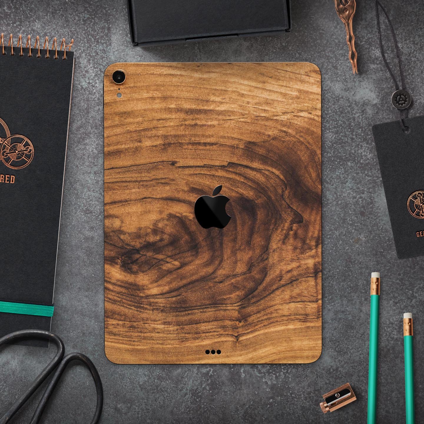 Raw Wood Planks V11 skin decal for Apple iPad Pro, showcasing a natural wood texture design with a smooth finish.
