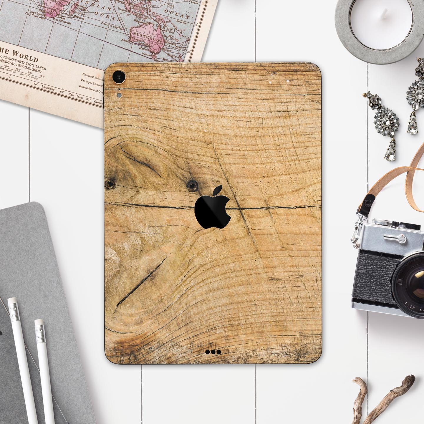 Raw Wood Planks V5 skin decal for Apple iPad Pro, showcasing a natural wood texture design with a premium finish.
