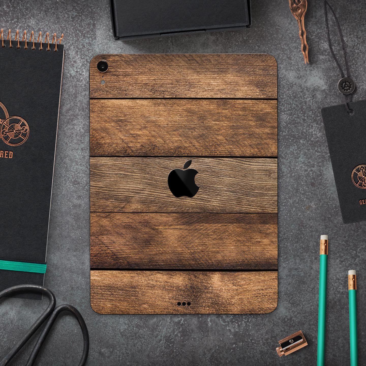 Raw Wood Planks V9 skin decal for Apple iPad Pro, showcasing a natural wood design with a sleek finish.