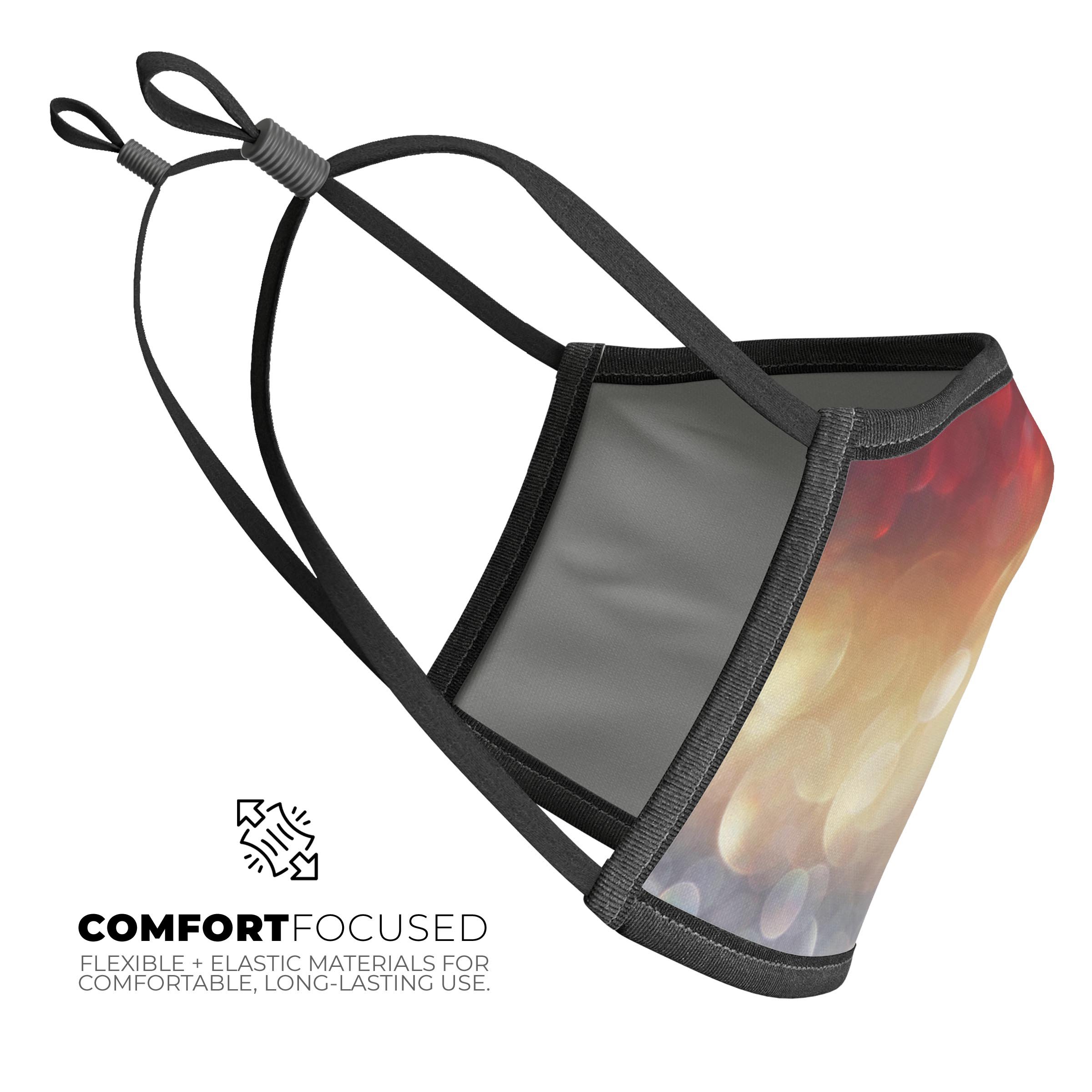 Red and Gold Unfocused Glowing Orbs face mask, showcasing vibrant colors and a 3D design, made in the USA.