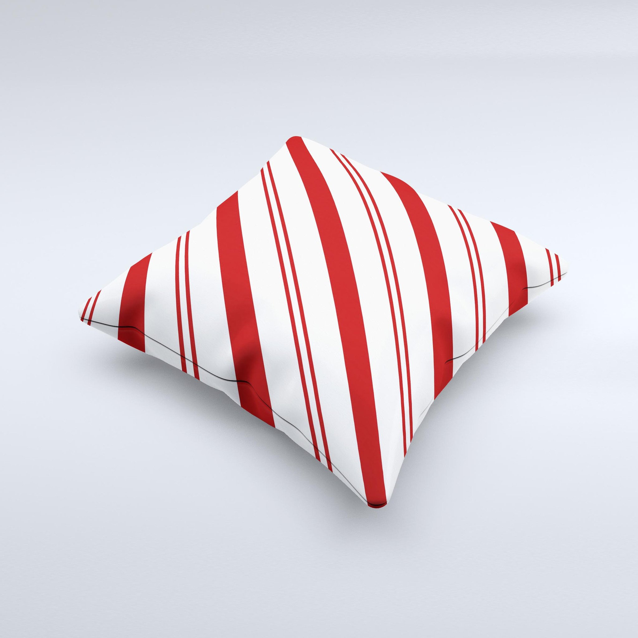 Red and white decorative throw pillow with slanted vector stripes, showcasing a unique handmade design.