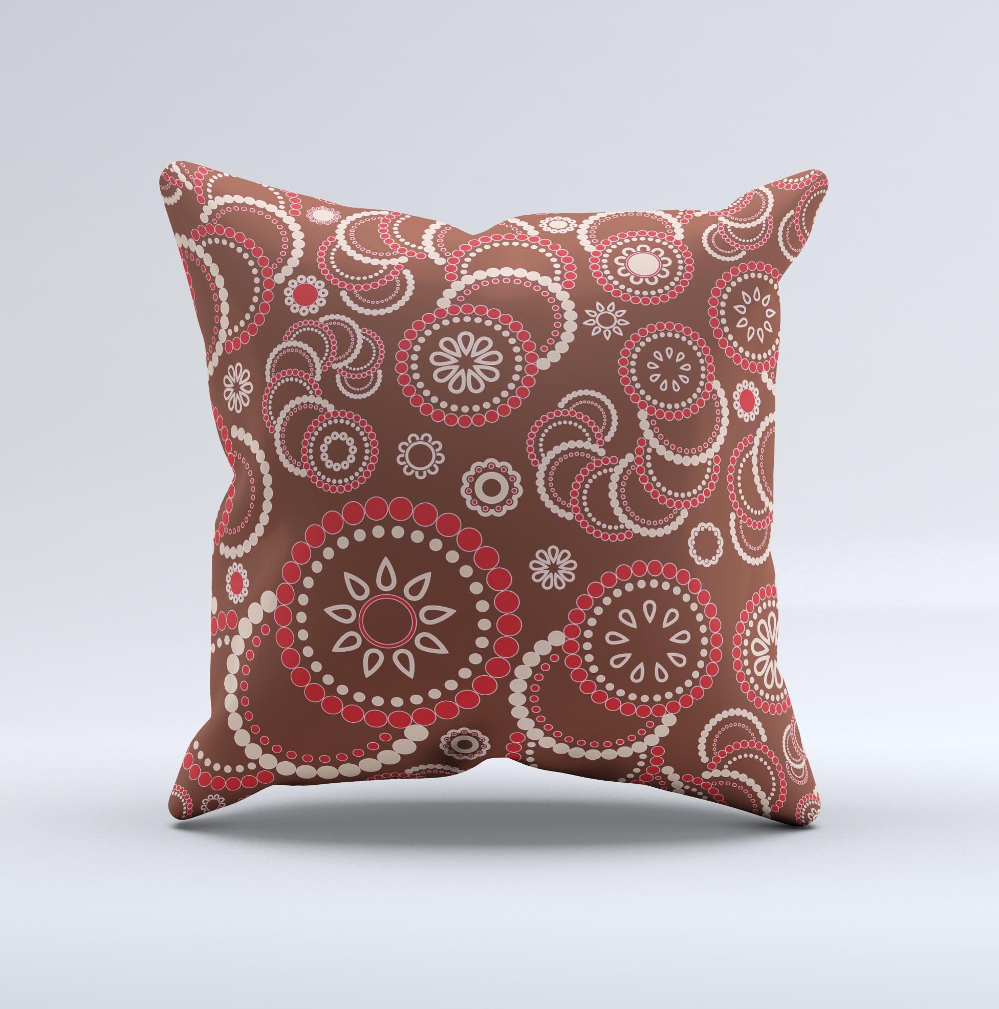 A beautifully handcrafted throw pillow featuring a vibrant red and brown flower pattern, showcasing unique imperfections from the printing process.
