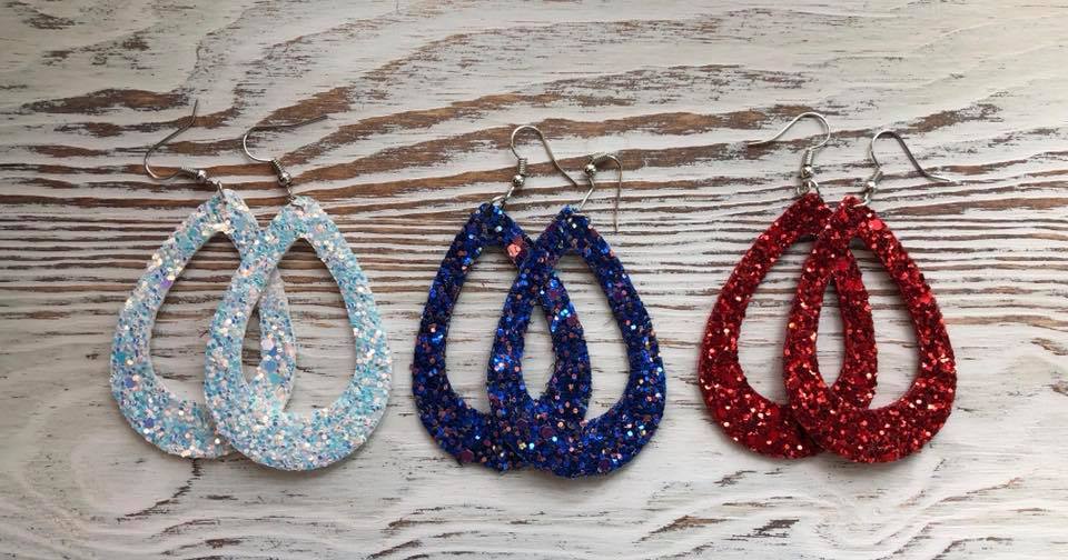 A pair of red, white, and blue glitter open teardrop earrings, showcasing a shimmering double-sided design, perfect for 4th of July celebrations.