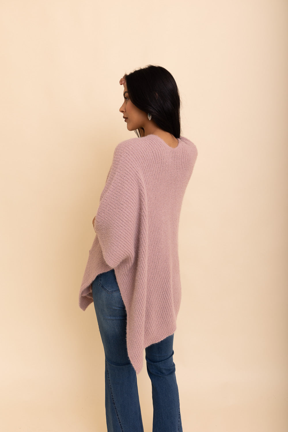 A cozy Relax & Chill Autumn Nights Boucle Cardigan in soft fabric, featuring two pockets and a stylish design, perfect for autumn wear.