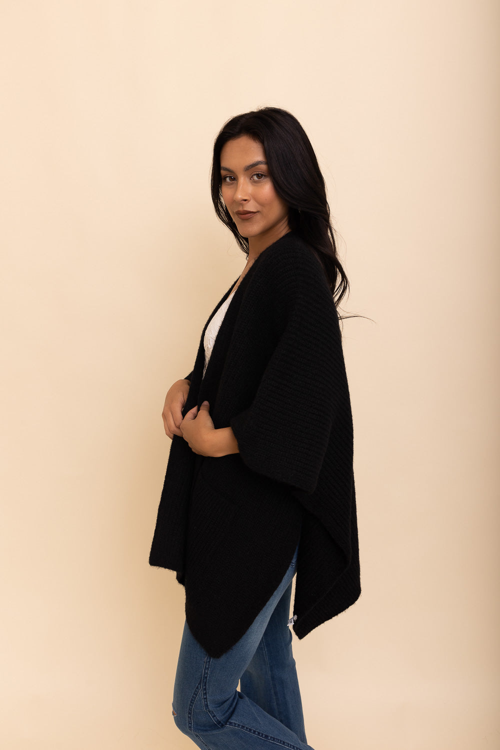 A cozy Relax & Chill Autumn Nights Boucle Cardigan in soft fabric, featuring two pockets and a stylish design, perfect for autumn wear.