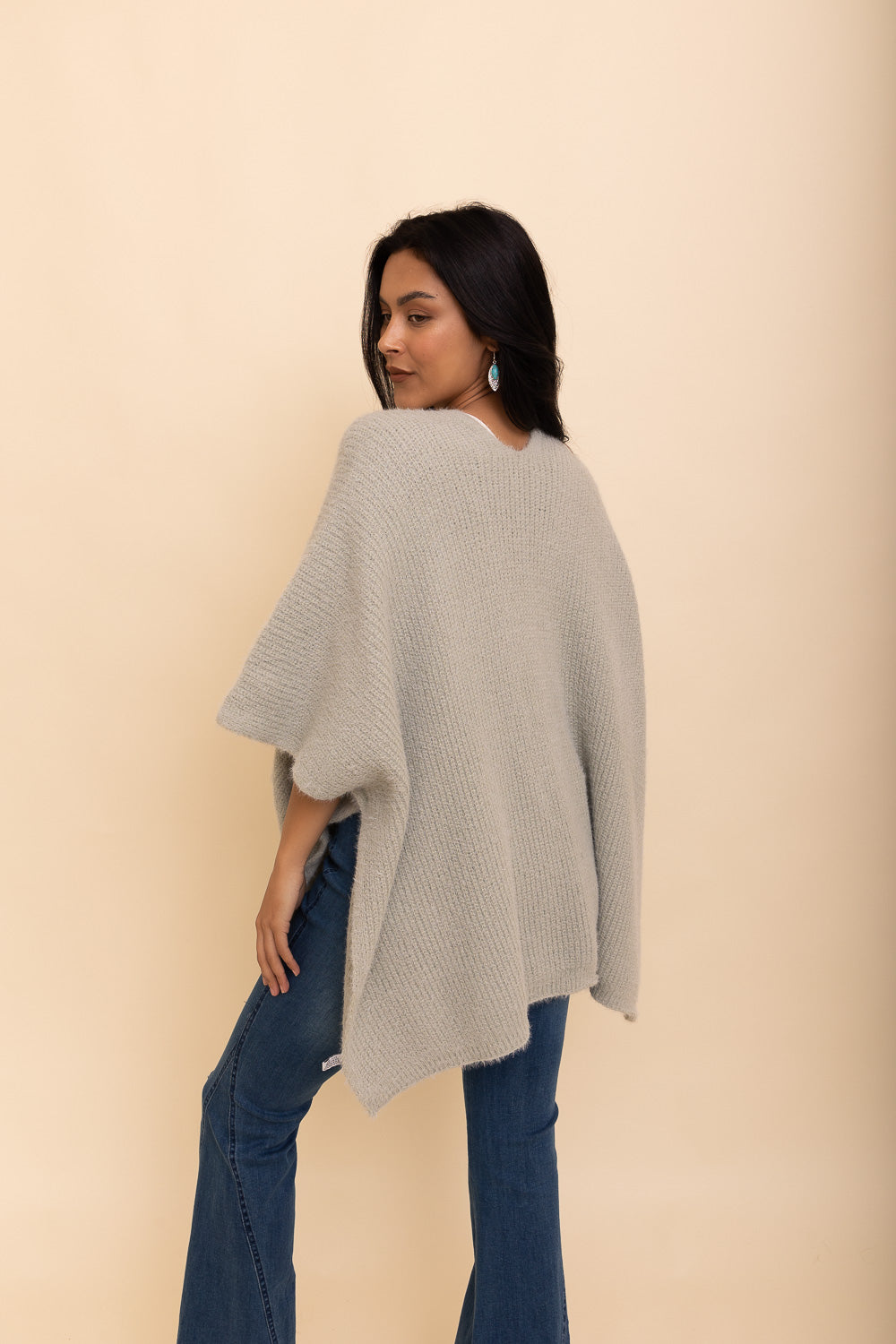 A cozy Relax & Chill Autumn Nights Boucle Cardigan in soft fabric, featuring two pockets and a stylish design, perfect for autumn wear.
