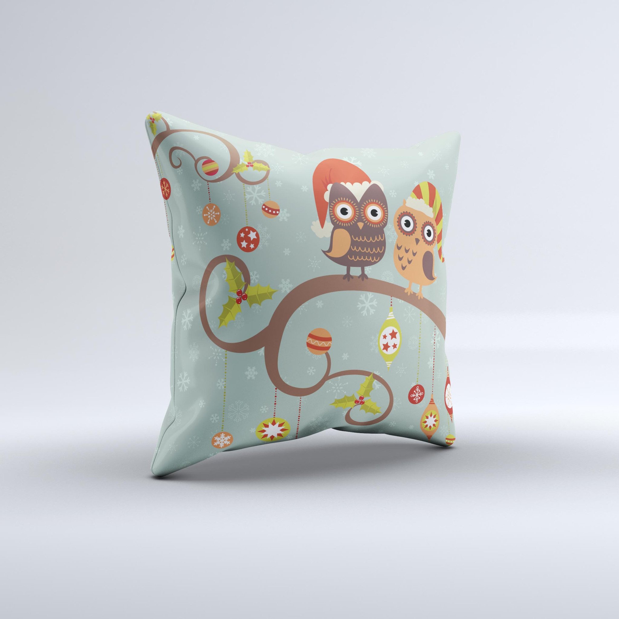 A decorative throw pillow featuring retro Christmas owls adorned with colorful ornaments, showcasing a unique hand-crafted design.