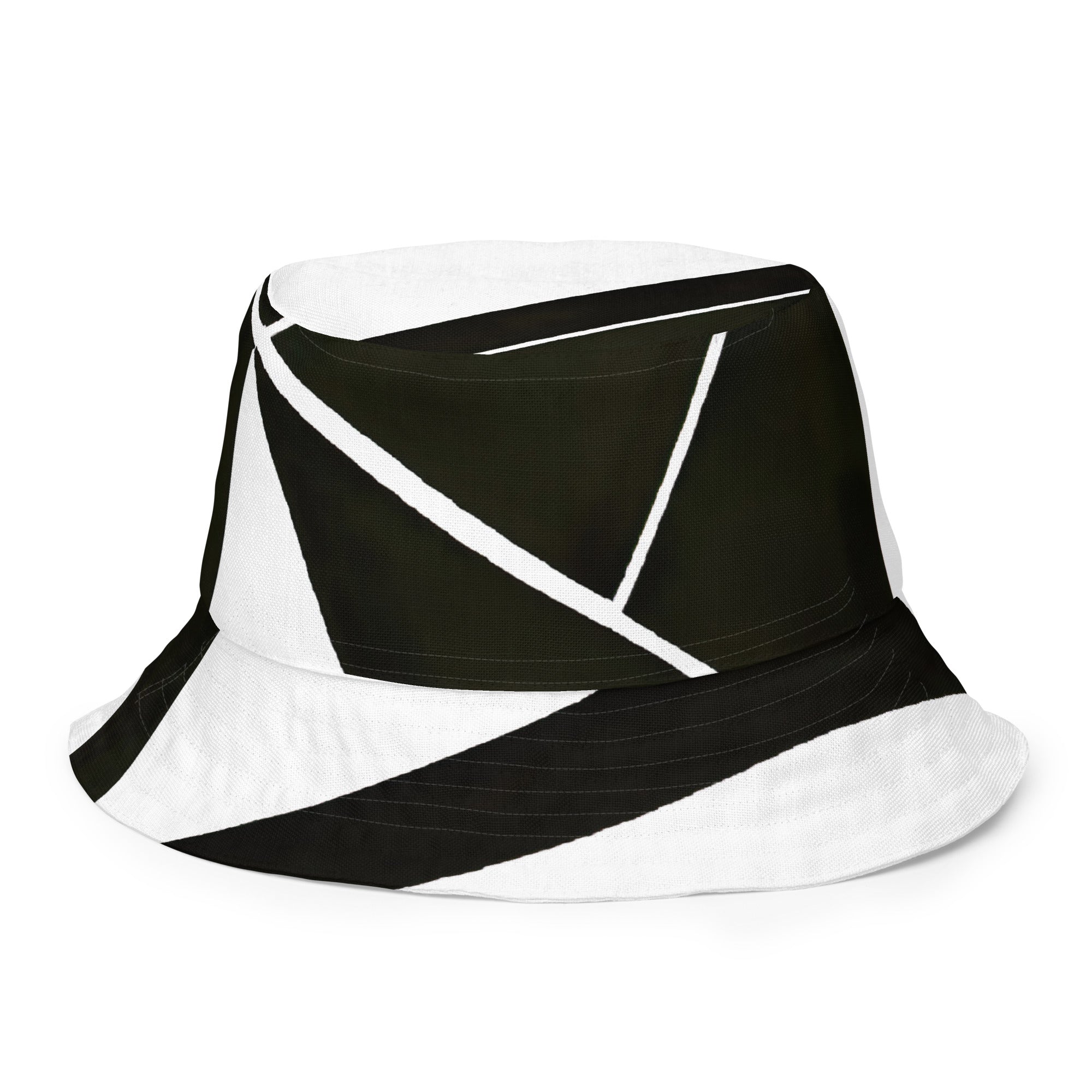 Reversible bucket hat featuring a black and white geometric pattern, showcasing its stylish design and breathable fabric.