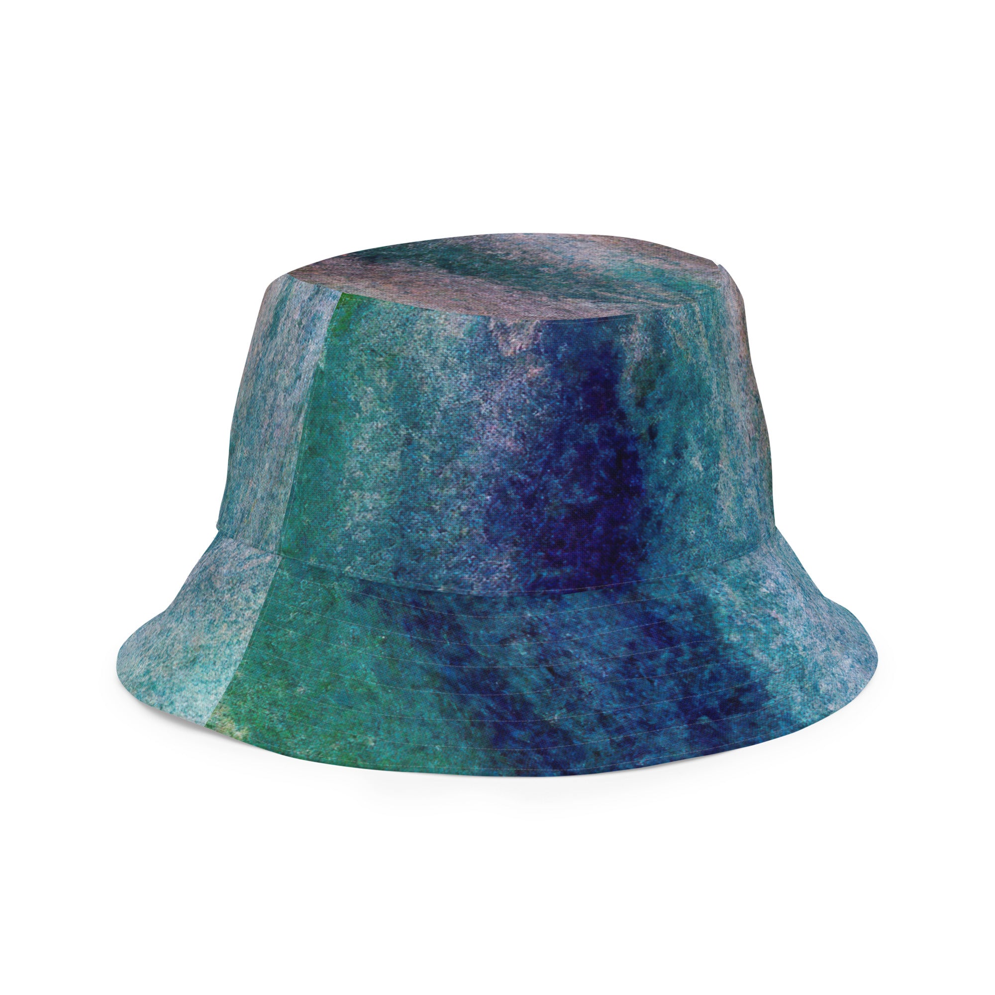 Reversible bucket hat featuring a blue hue watercolor abstract print, showcasing its stylish design and breathable fabric.