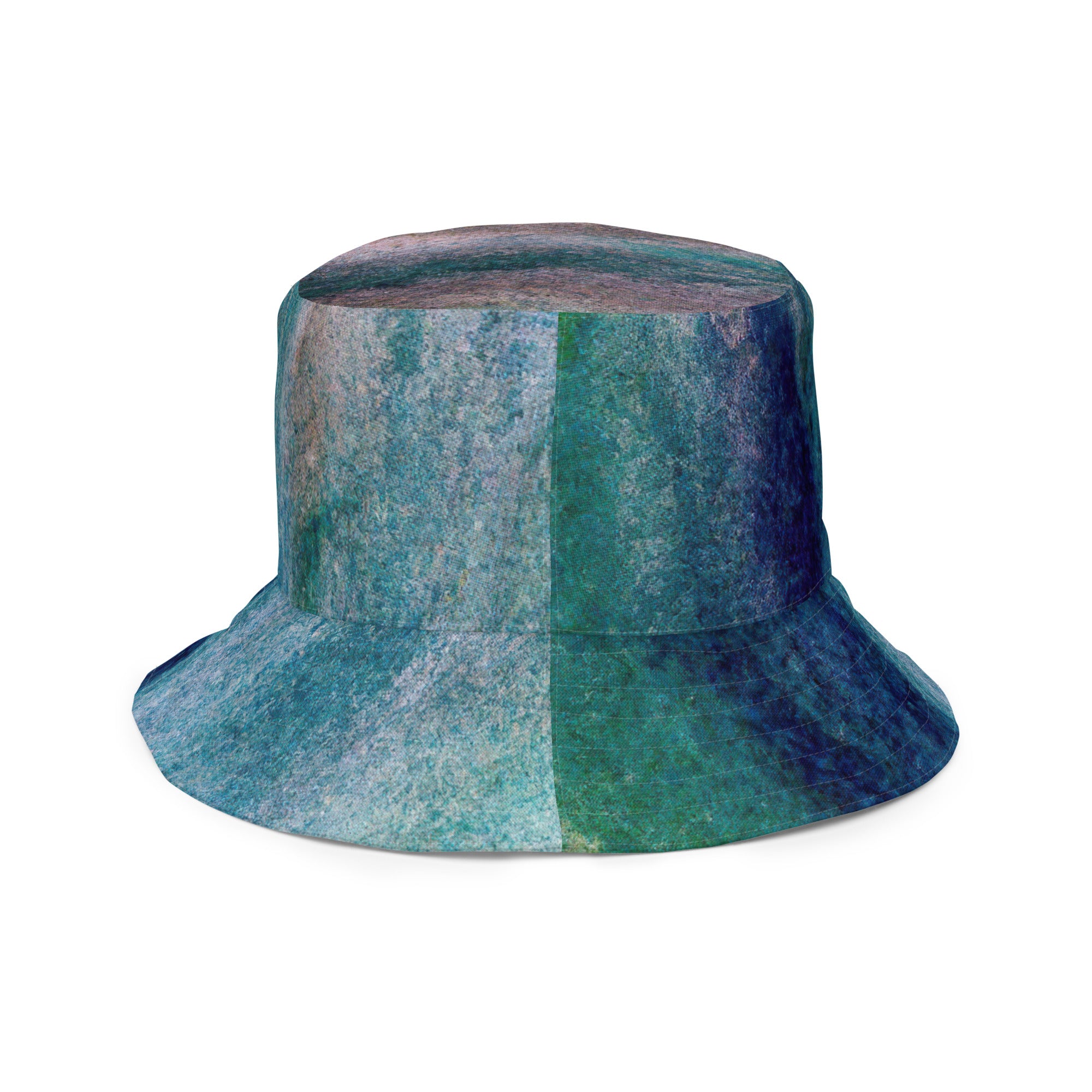 Reversible bucket hat featuring a blue hue watercolor abstract print, showcasing its stylish design and breathable fabric.