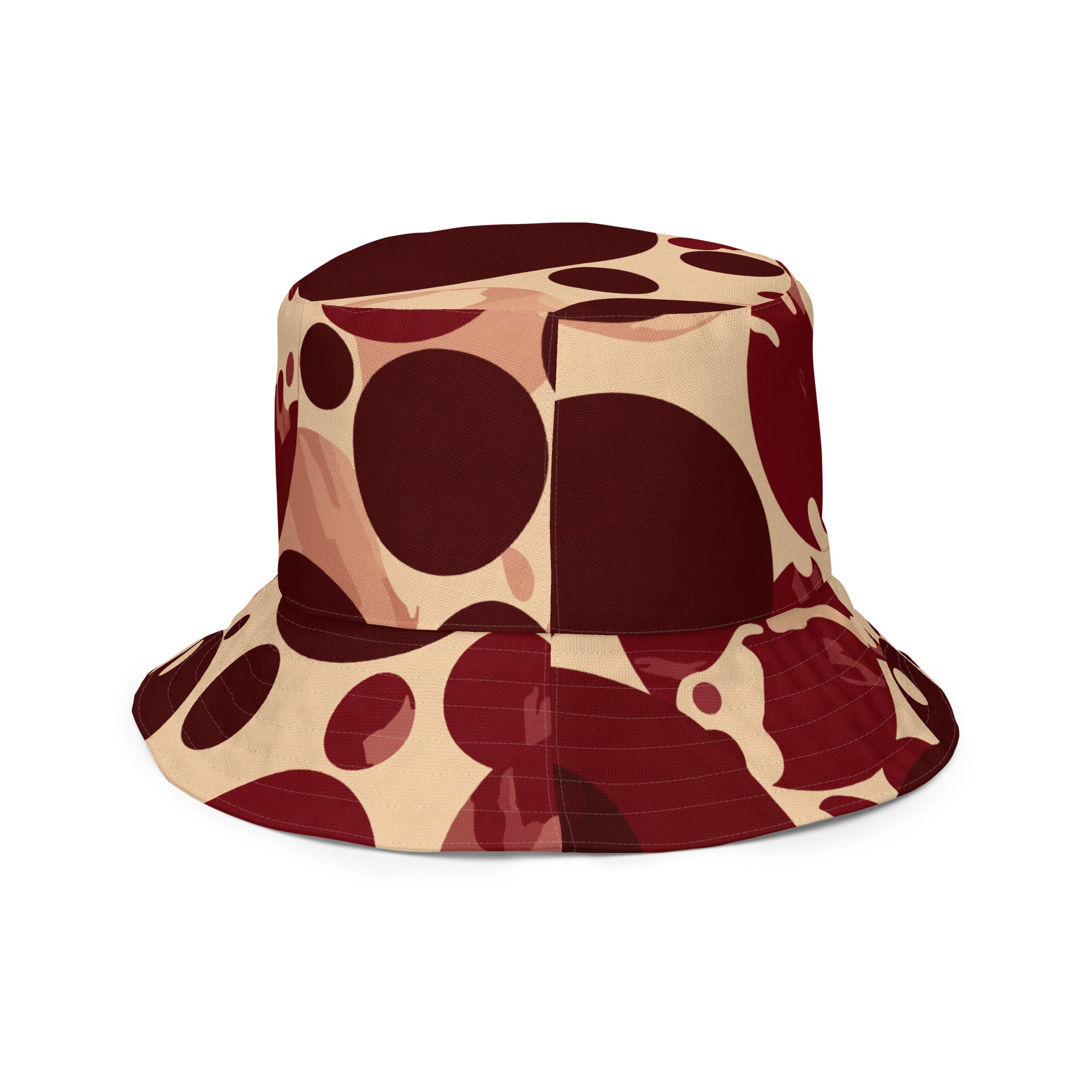 Reversible bucket hat featuring burgundy and beige circular print, showcasing its stylish design and premium fabric.