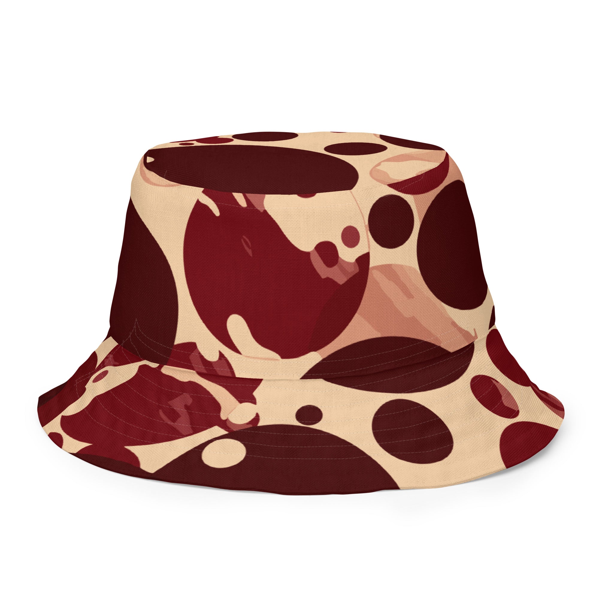 Reversible bucket hat featuring burgundy and beige circular print, showcasing its stylish design and premium fabric.