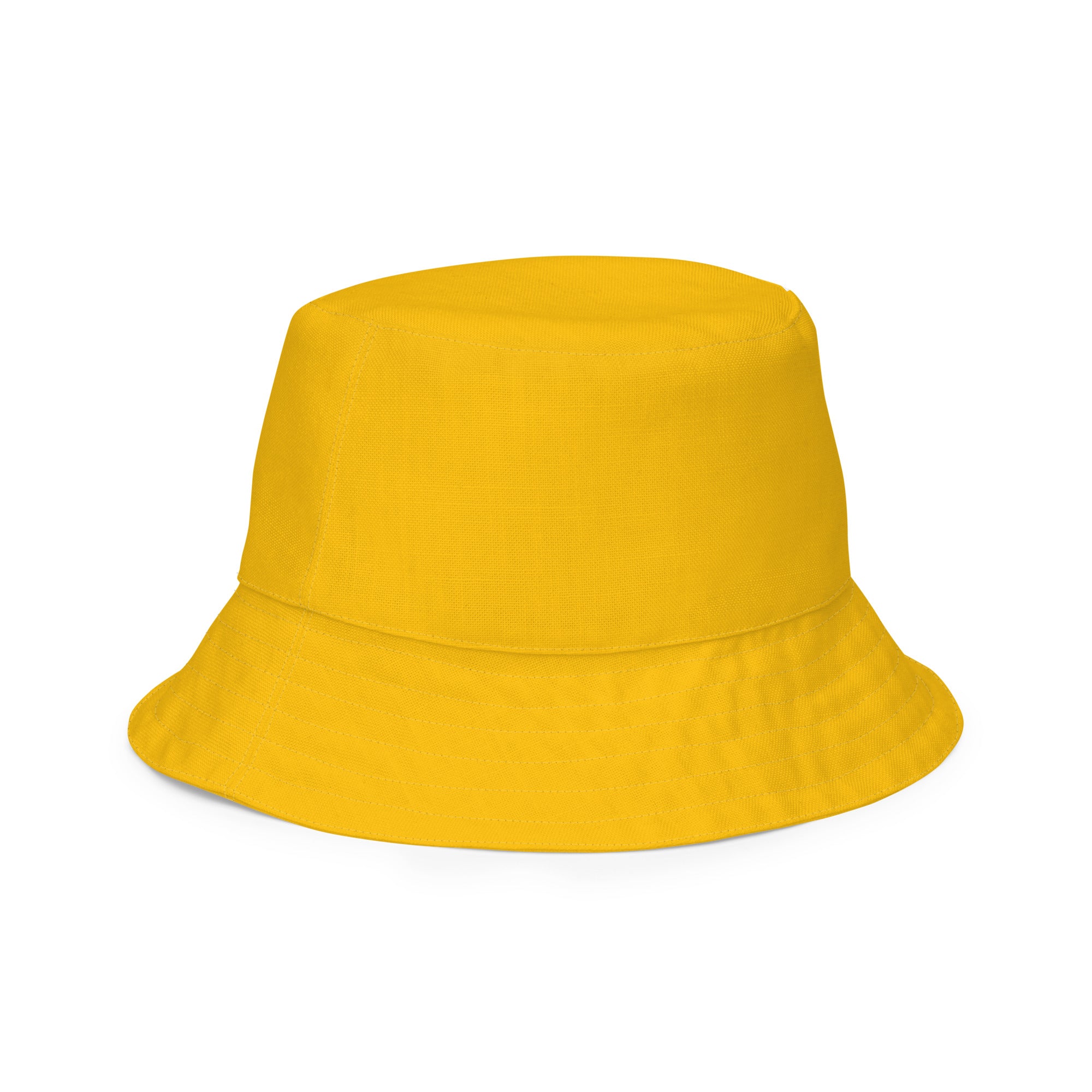Reversible Bucket Hat in Golden Yellow showcasing its vibrant color and wide brim, perfect for sun protection and stylish outdoor wear.