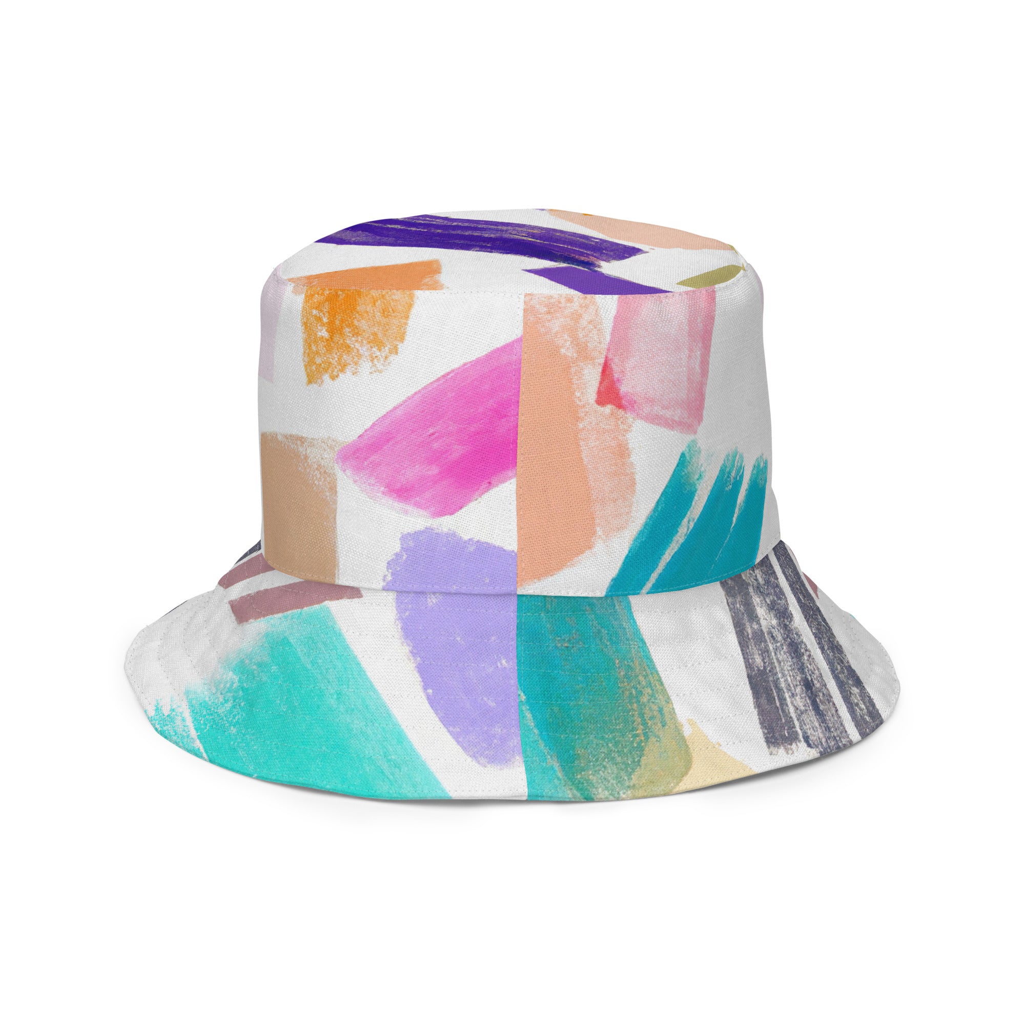 Reversible bucket hat featuring a multicolor pastel geometric brush stroke pattern, showcasing its stylish design and premium fabric.
