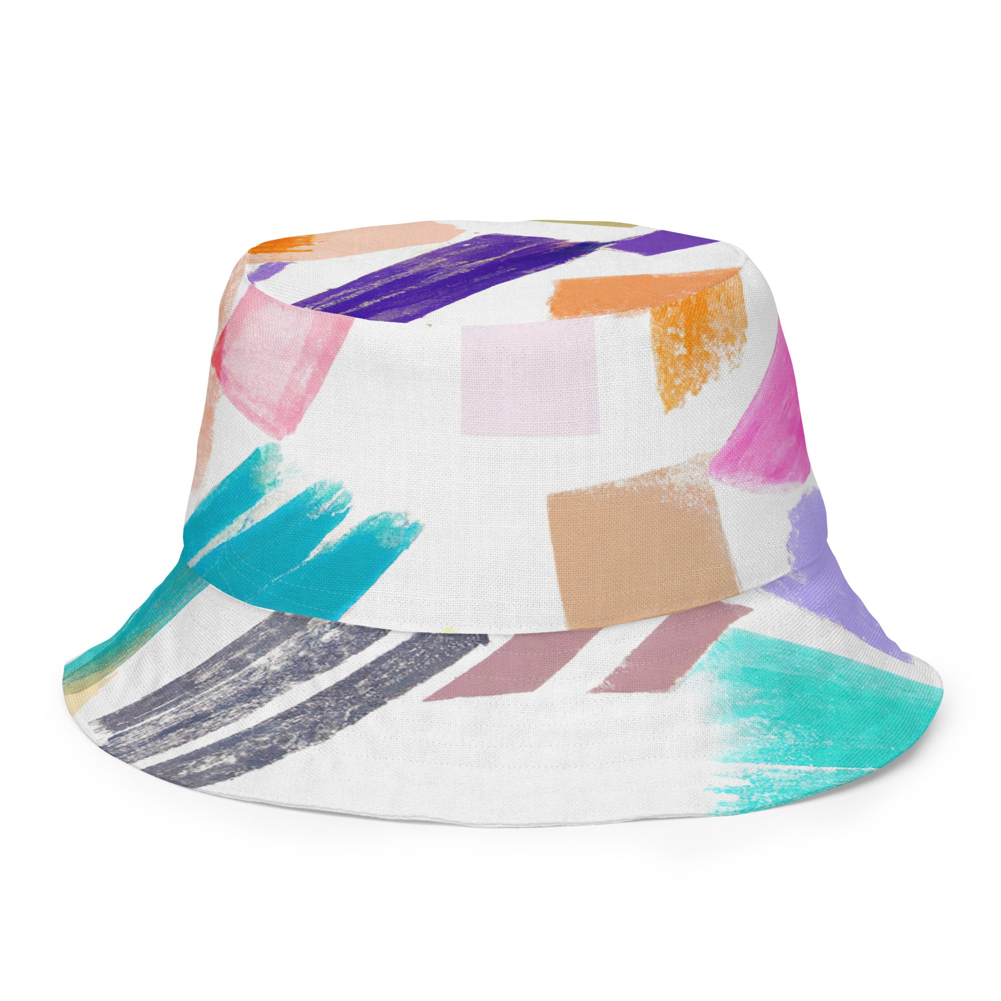 Reversible bucket hat featuring a multicolor pastel geometric brush stroke pattern, showcasing its stylish design and premium fabric.