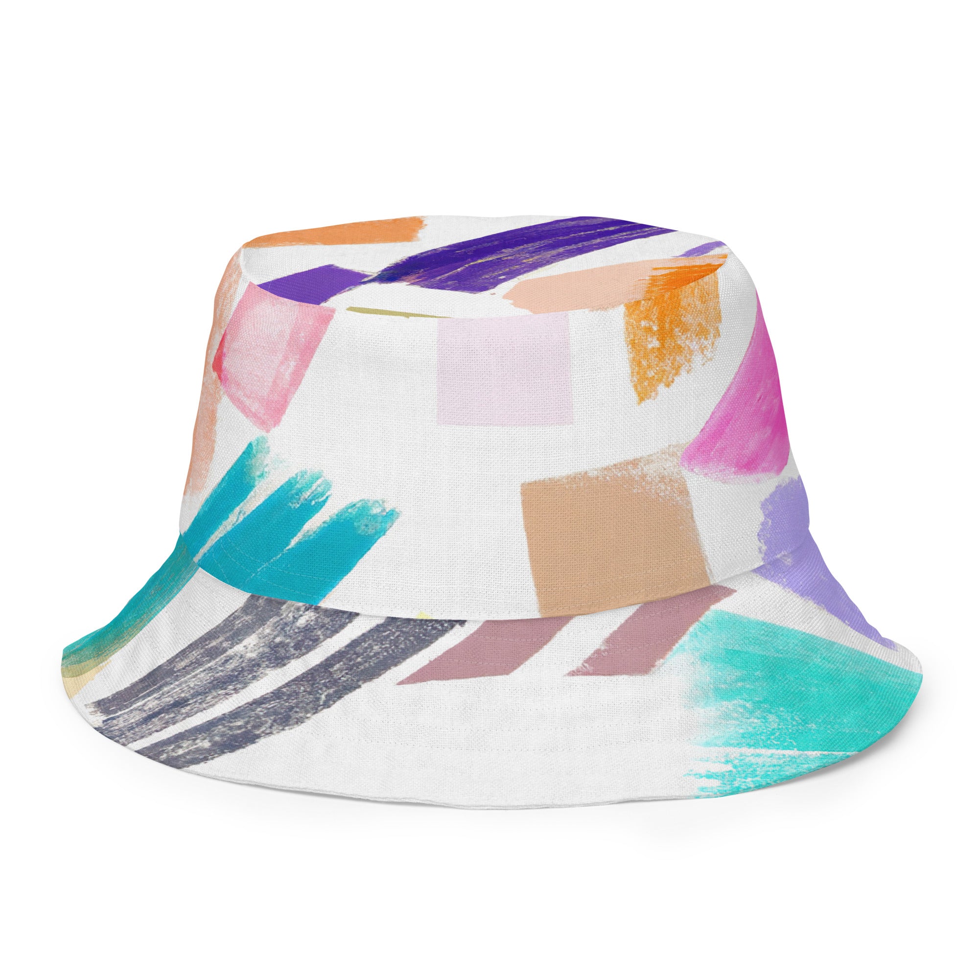 Reversible bucket hat featuring a multicolor pastel geometric brush stroke pattern, showcasing its stylish design and premium fabric.