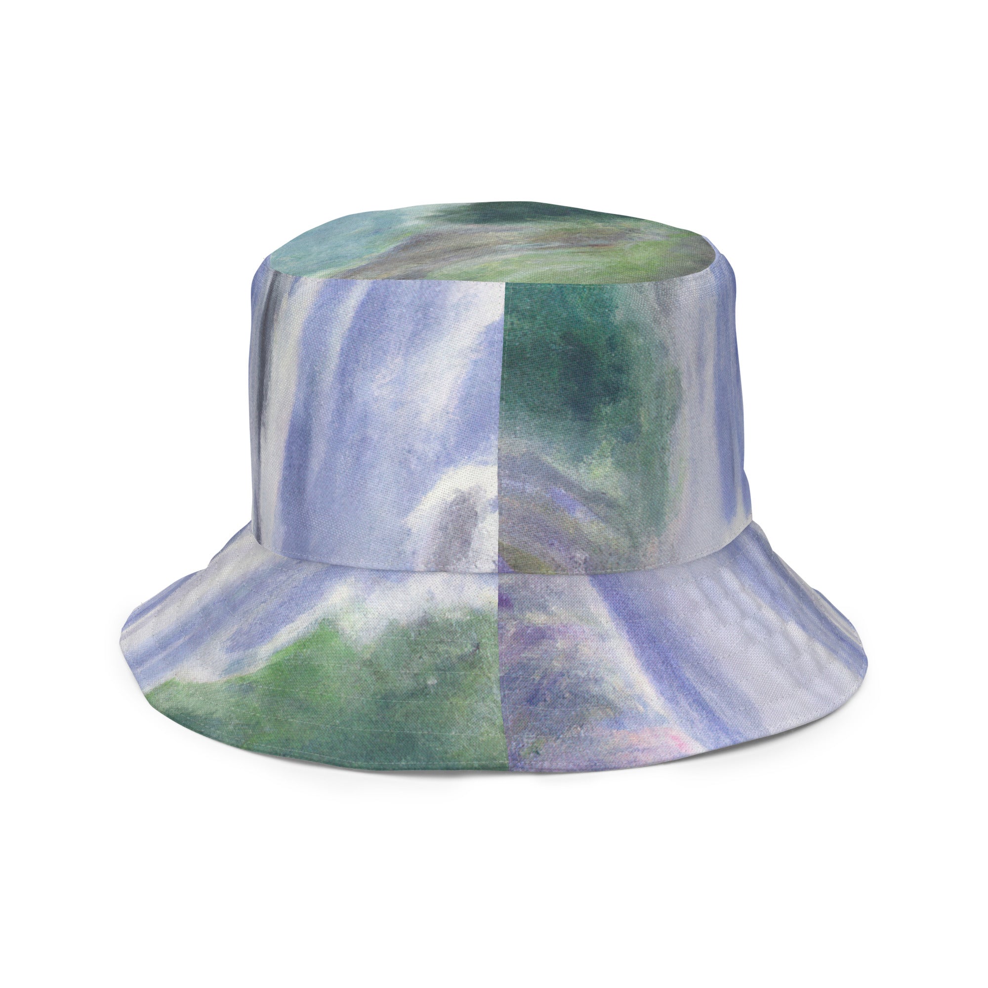 Reversible bucket hat featuring a purple watercolor waterfall and green landscape print, showcasing its stylish design and breathable fabric.