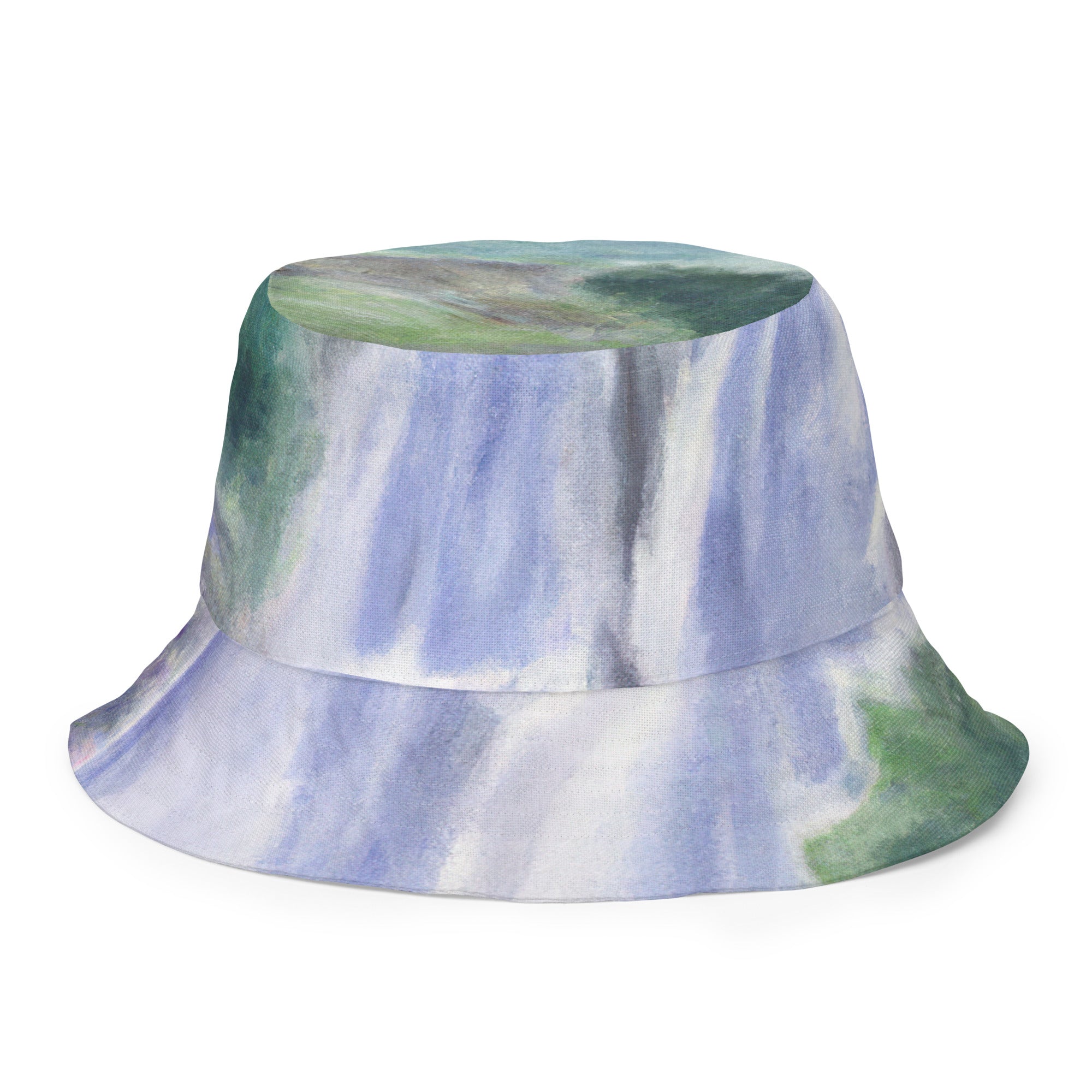 Reversible bucket hat featuring a purple watercolor waterfall and green landscape print, showcasing its stylish design and breathable fabric.