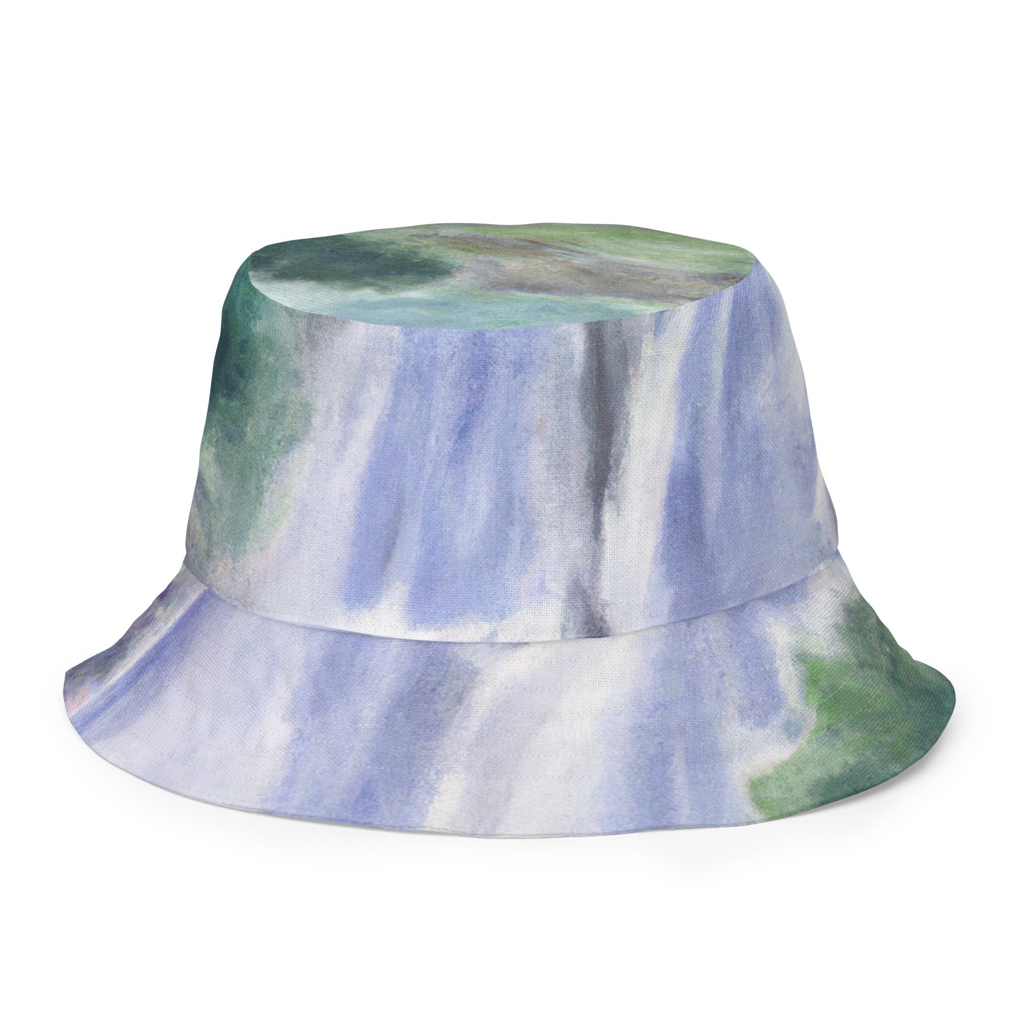Reversible bucket hat featuring a purple watercolor waterfall and green landscape print, showcasing its stylish design and breathable fabric.