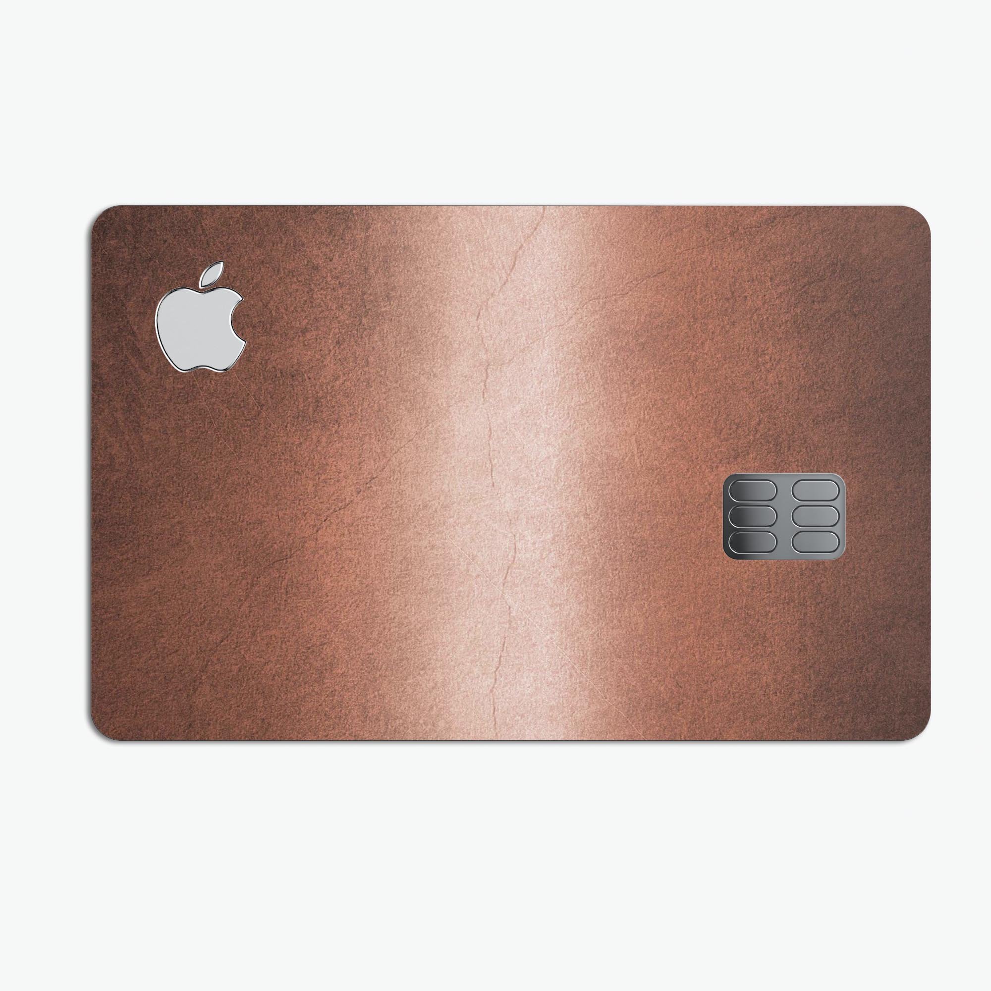 Rose Gold Cracked Surface V1 decal skin for Apple Card, showcasing a stylish design with a cracked surface pattern.
