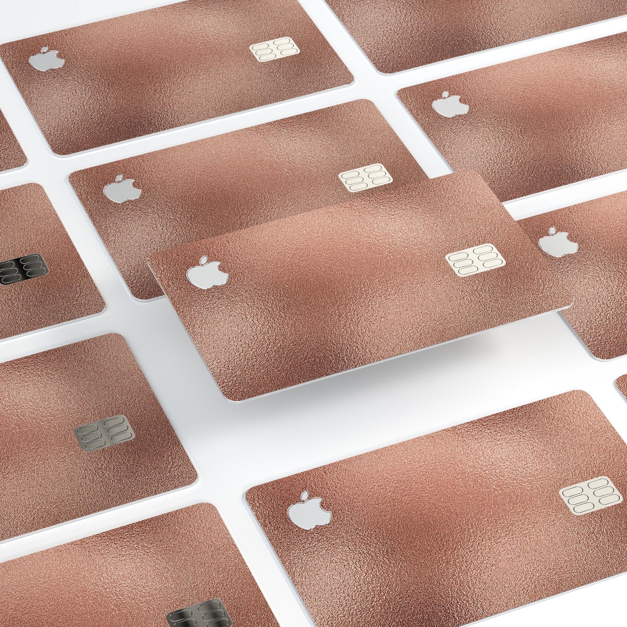 Rose Gold Digital Foiled Surface V1 decal applied on an Apple Card, showcasing its premium design and protective features.