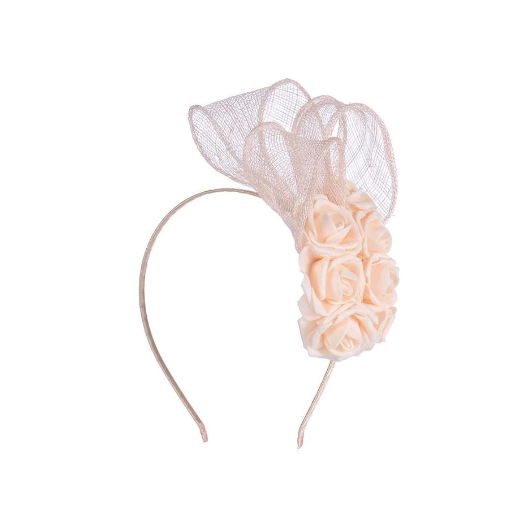 Ruby Rocks Rosita Fascinator in pale peach featuring delicate roses and structured ribbons on a comfortable headband.