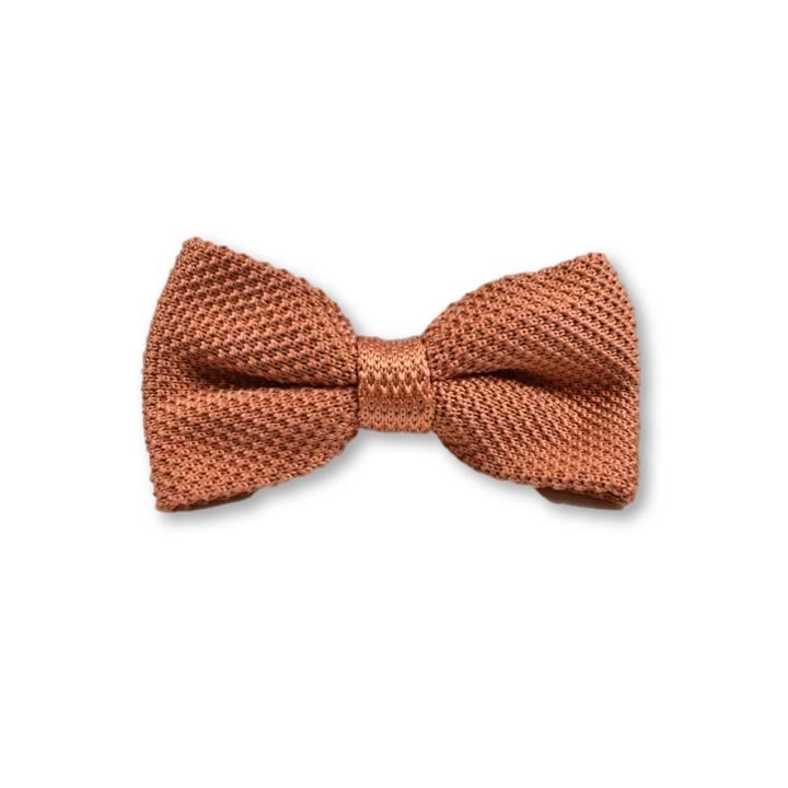 Rustic orange knitted bow tie with a textured design, perfect for formal and casual occasions.