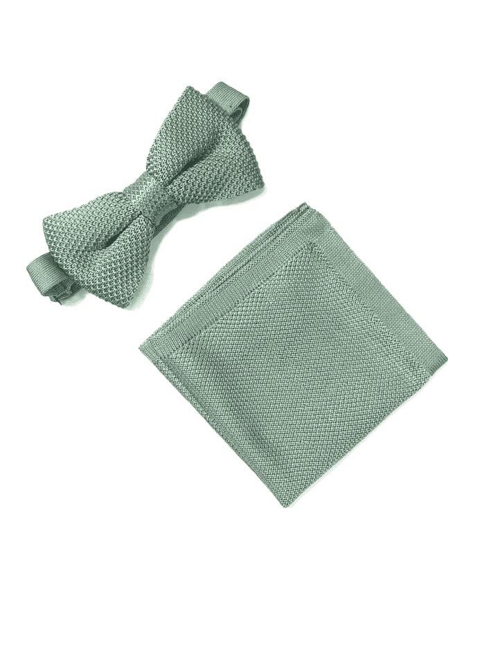 Sage green knitted bow tie and matching pocket square set displayed elegantly on a white background.