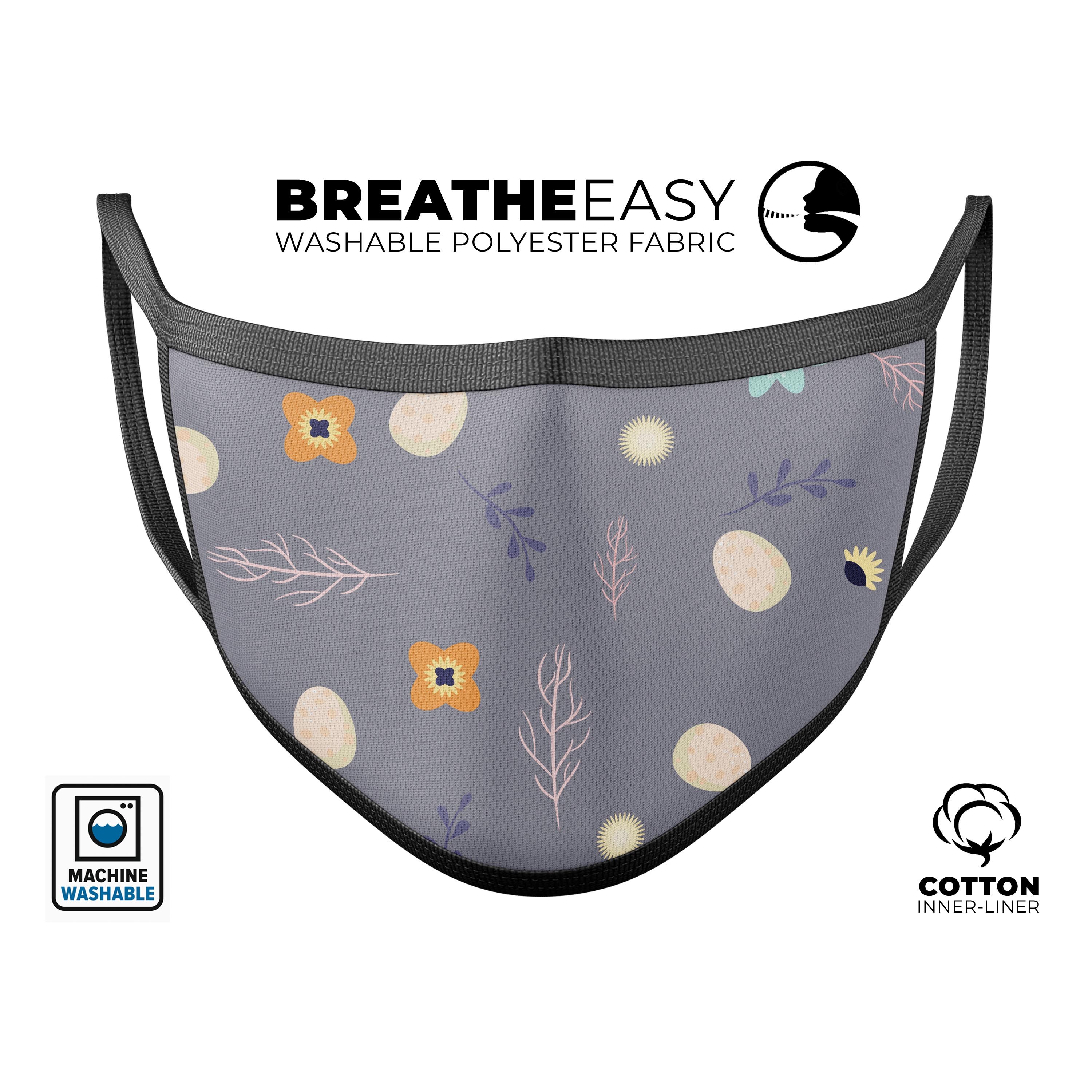 Scattered Easter Basket design on a gray reusable face mask, showcasing adjustable ear loops and soft cotton interior.