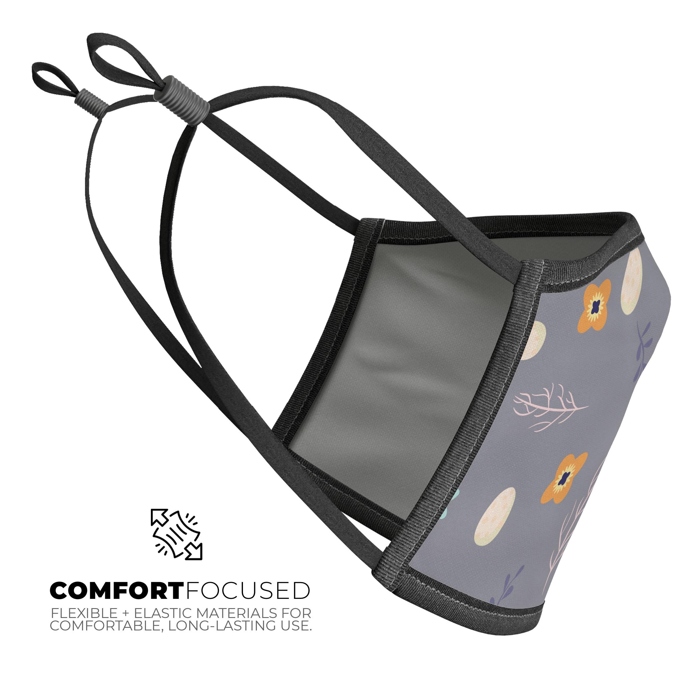 Scattered Easter Basket design on a gray reusable face mask, showcasing adjustable ear loops and soft cotton interior.