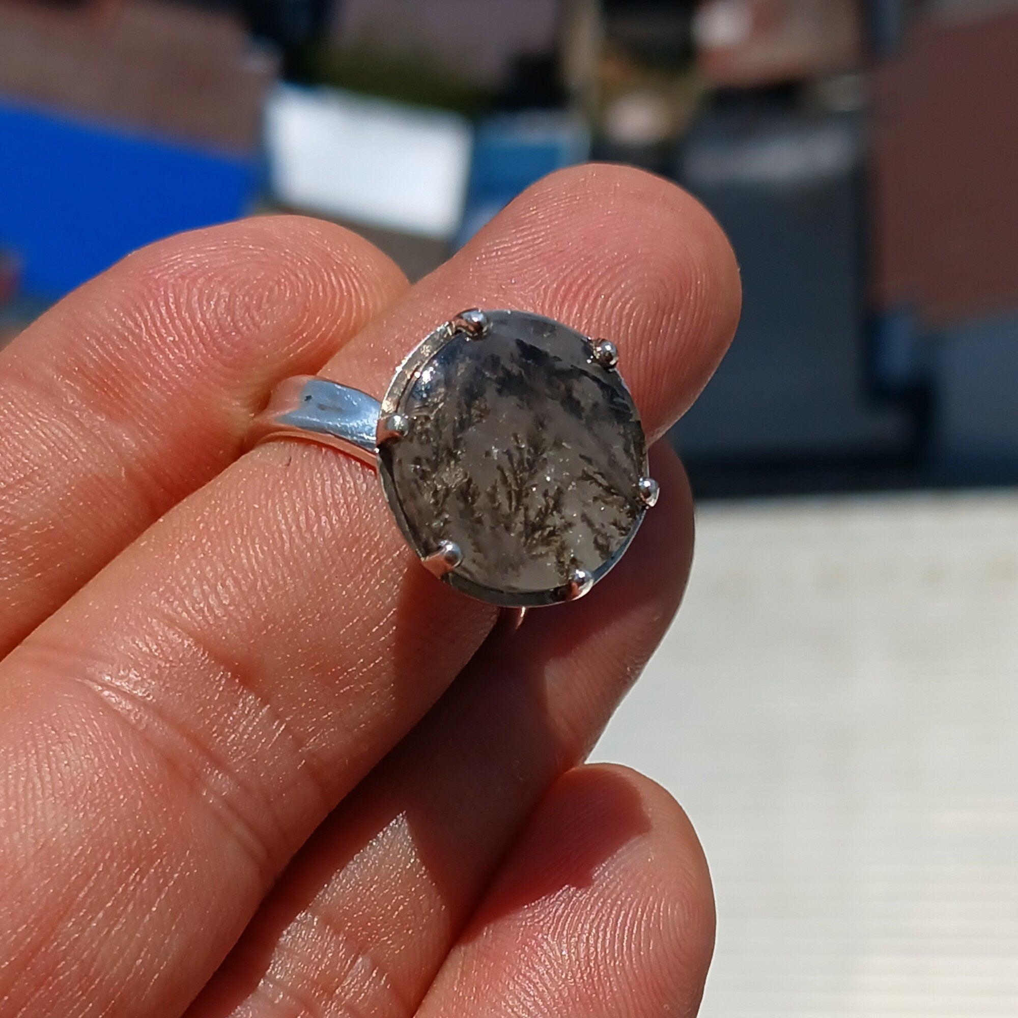 A stunning Scenic Dendrite Silver Ring featuring a round cut Dendrite Tree Agate set in polished sterling silver, showcasing intricate natural patterns.