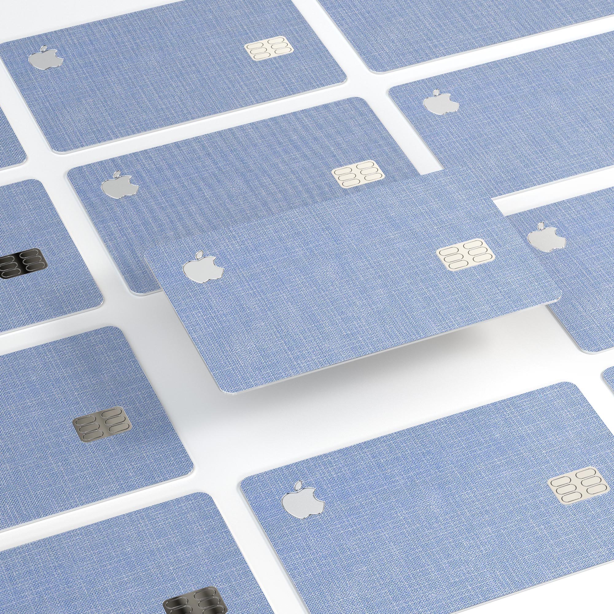 Scratched blue fabric pattern decal skin-kit for Apple Card, showcasing its premium vinyl material and stylish design.